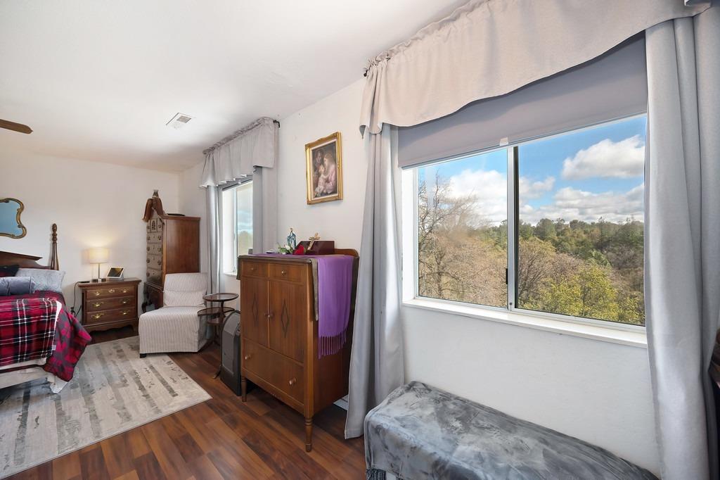 6930 Loggers Hollow Road Somerset, CA 95684 - Photo 20 of 42 a living room with furniture and a window