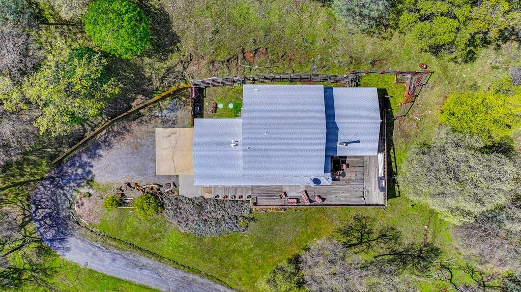 6930 Loggers Hollow Road Somerset, CA 95684 - Photo 30 of 42 an aerial view of a house with a yard