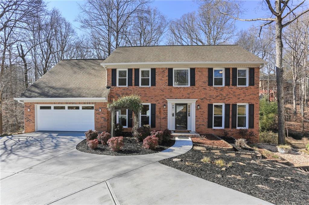 355 Ridge Court Roswell, GA 30076 - Photo 1 of 1 Brick front traditional freshly landscaped, new driveway, new garage door.