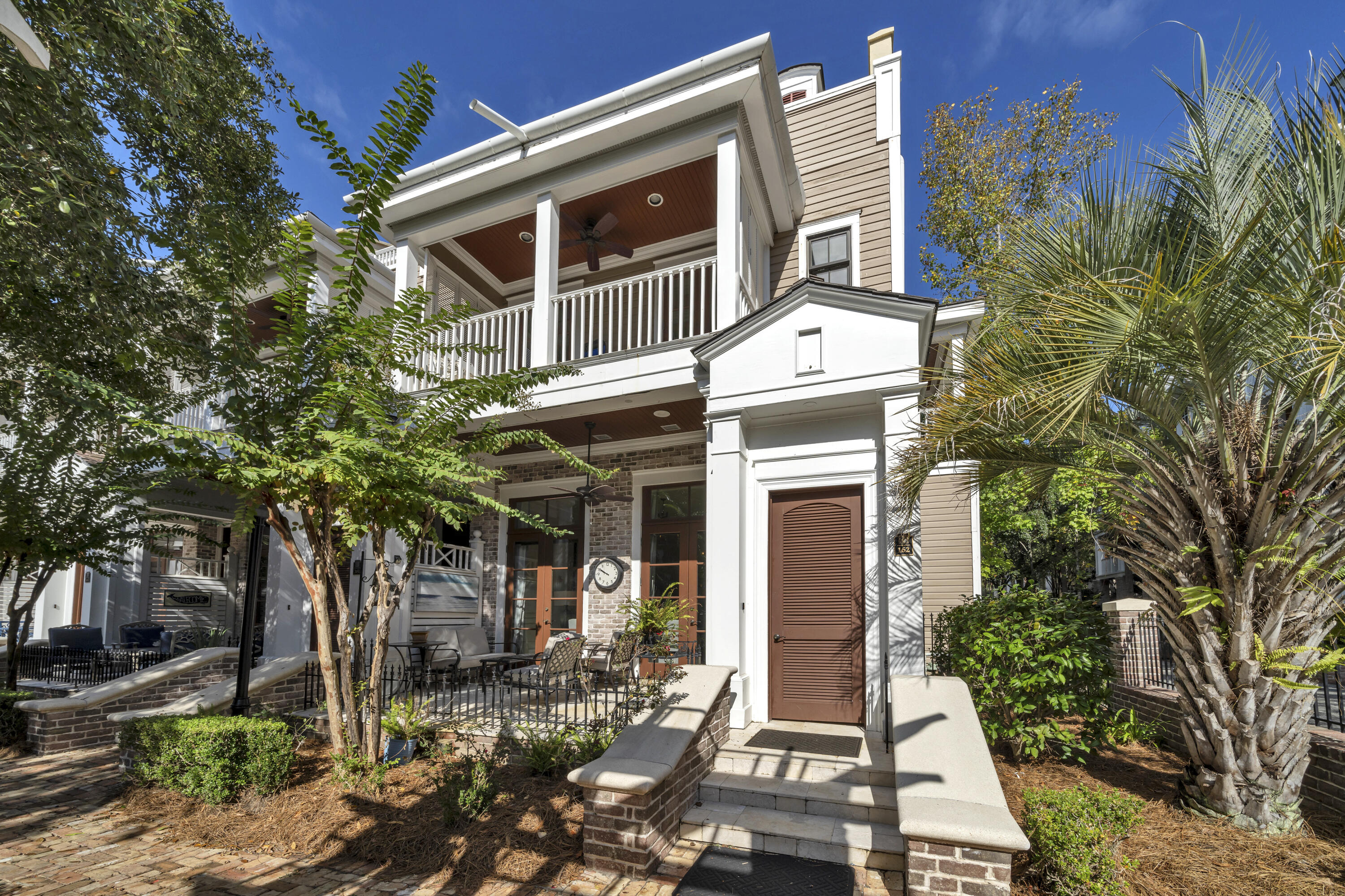 a front view of a house with yard