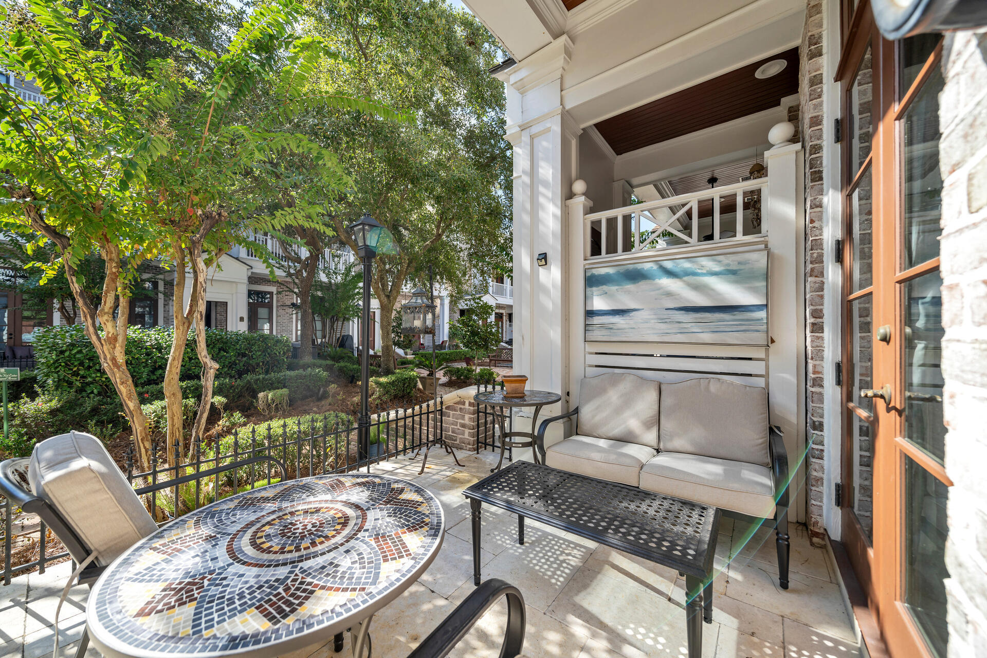 9201 Market Street Inn, Unit 162 Miramar Beach, FL 32550 - Photo 12 of 67 a view of a patio with couple of chairs and a table