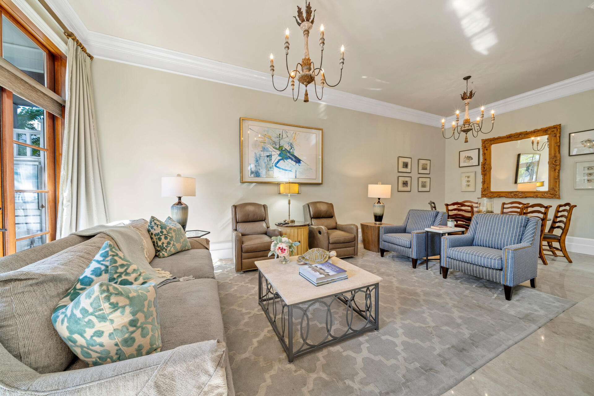 9201 Market Street Inn, Unit 162 Miramar Beach, FL 32550 - Photo 16 of 67 a living room with furniture dining area and a chandelier