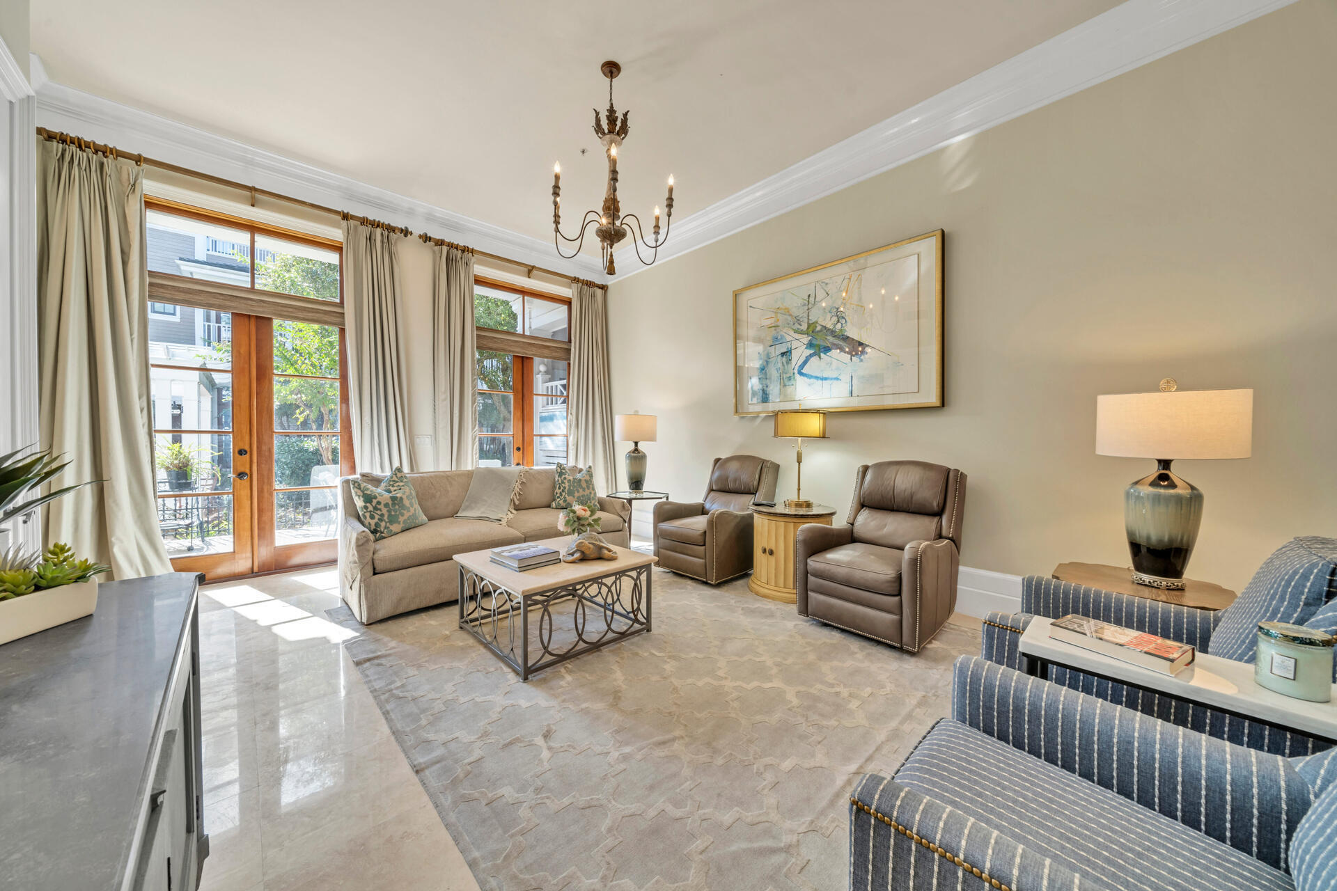 9201 Market Street Inn, Unit 162 Miramar Beach, FL 32550 - Photo 18 of 67 a living room with furniture and a chandelier