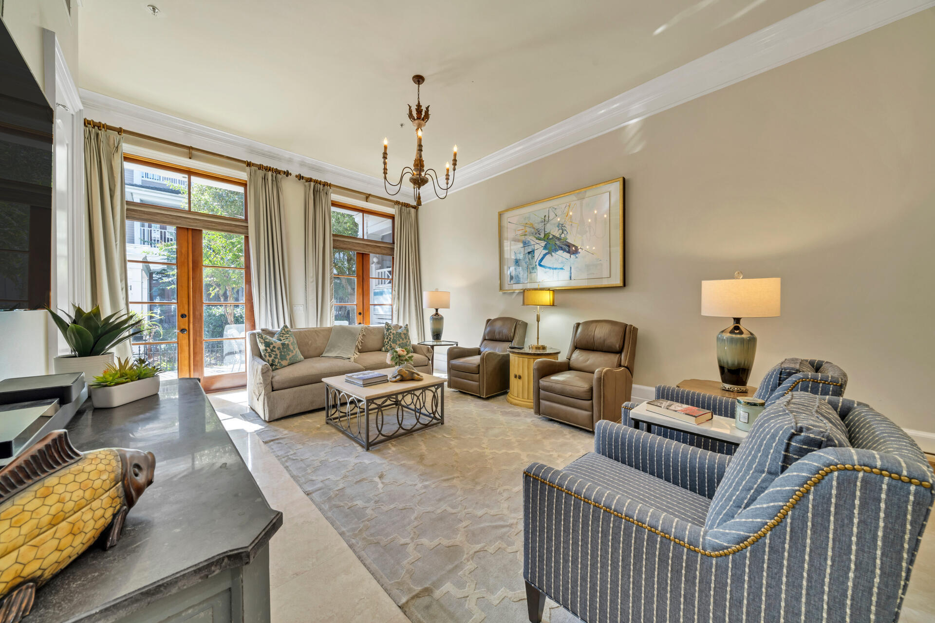 9201 Market Street Inn, Unit 162 Miramar Beach, FL 32550 - Photo 19 of 67 a living room with furniture and a chandelier