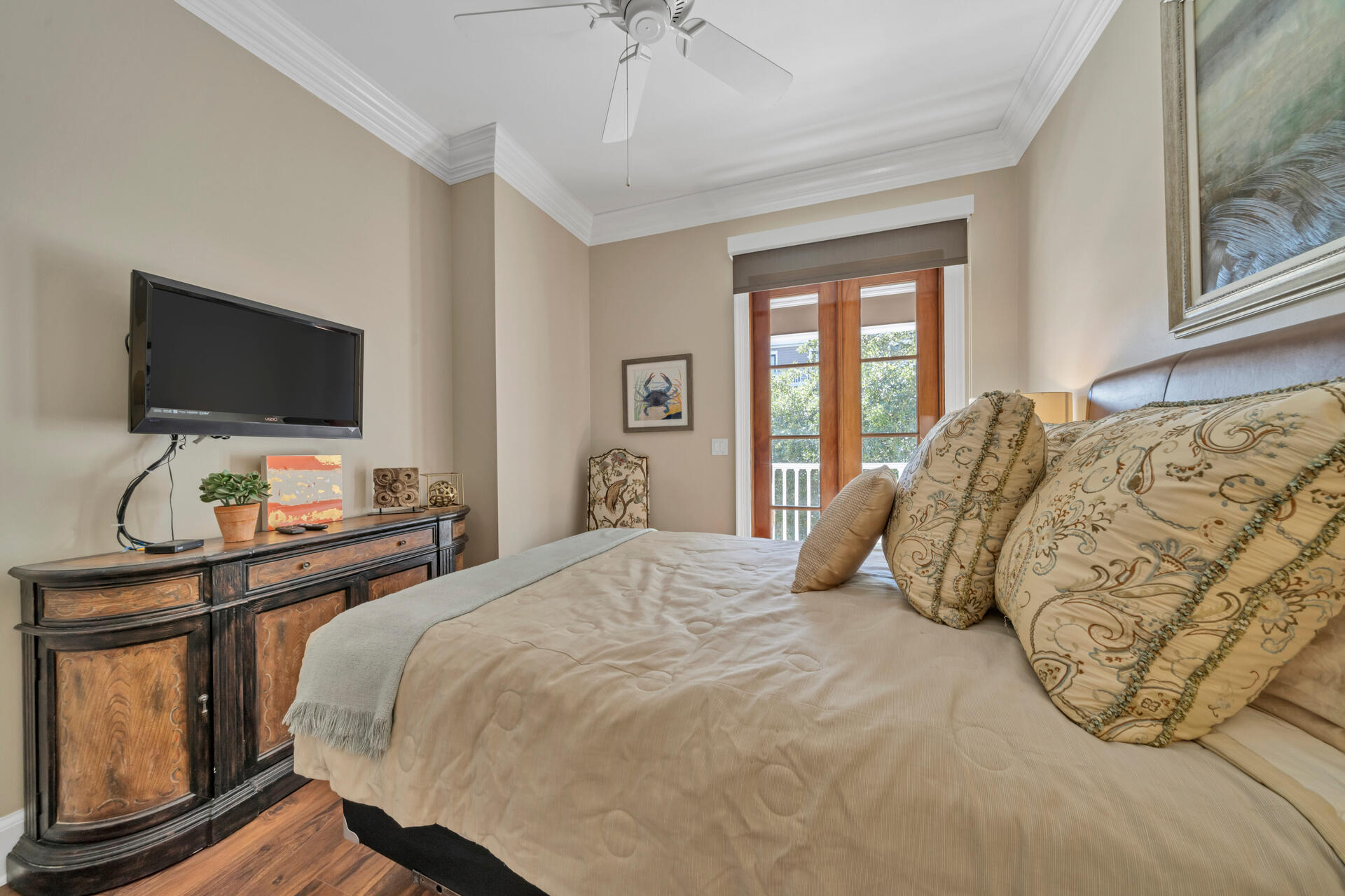 9201 Market Street Inn, Unit 162 Miramar Beach, FL 32550 - Photo 37 of 67 a bedroom with a bed and flat screen tv