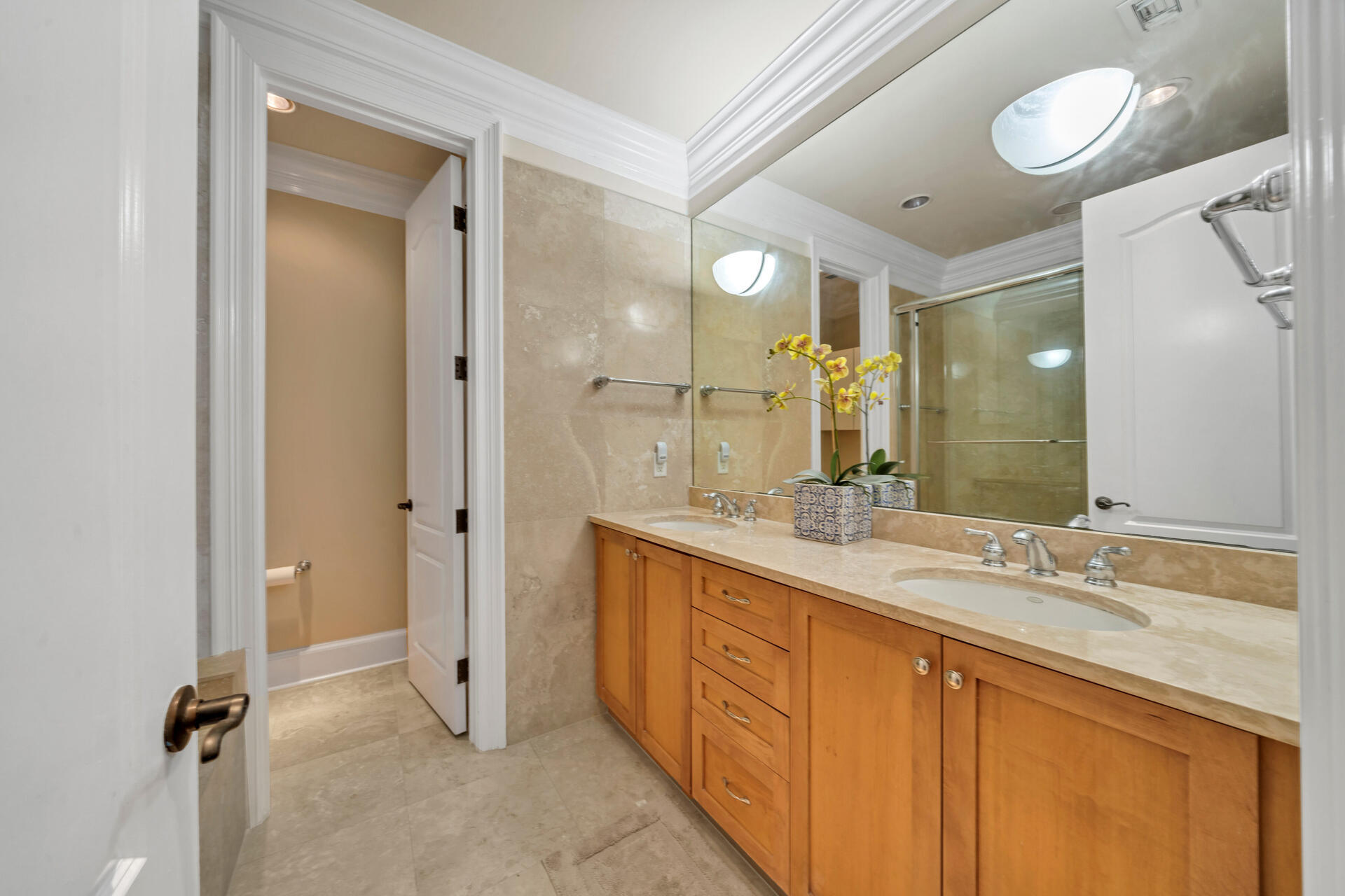 9201 Market Street Inn, Unit 162 Miramar Beach, FL 32550 - Photo 39 of 67 a spacious bathroom with a double vanity sink mirror and a shower