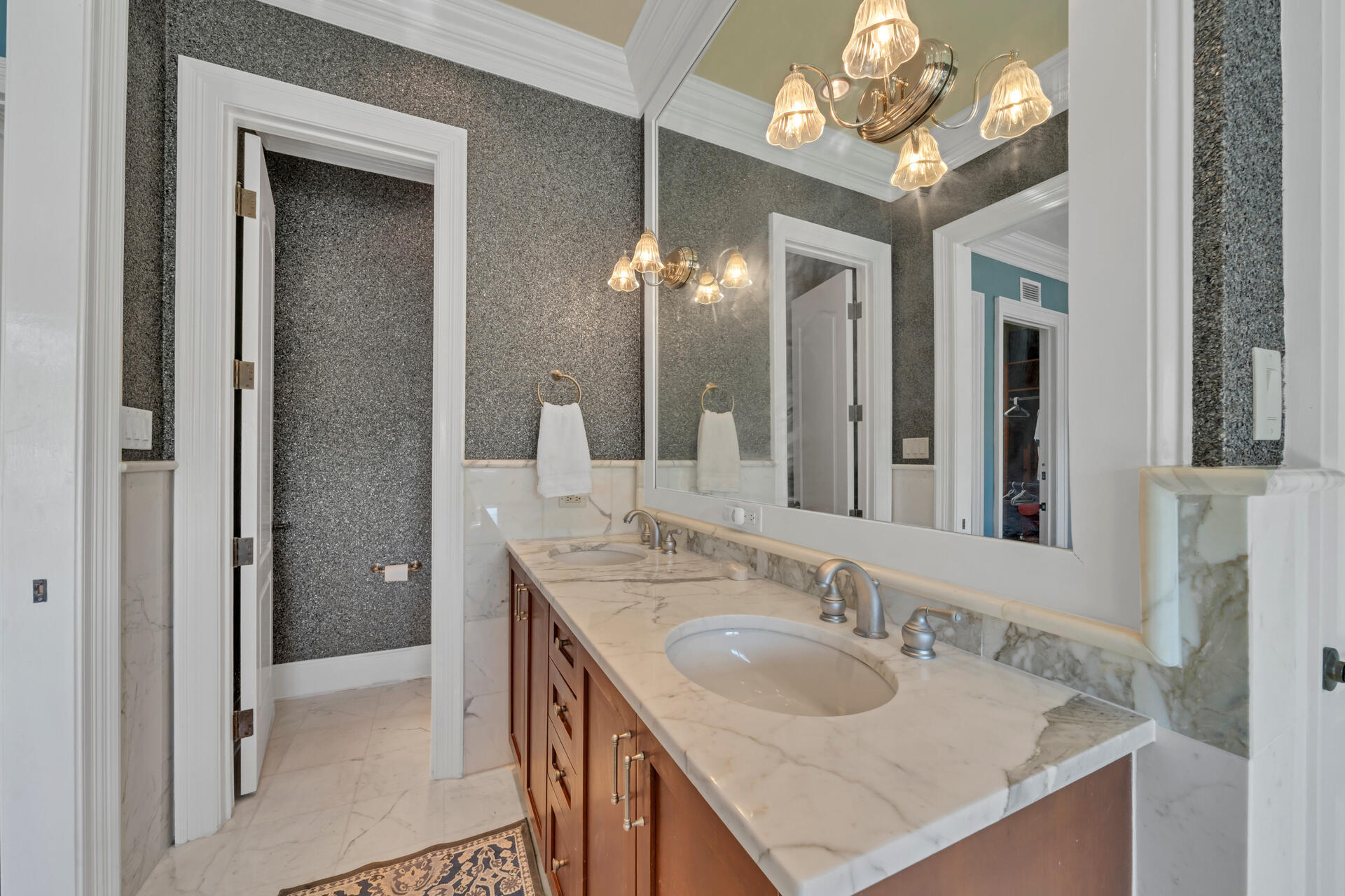 9201 Market Street Inn, Unit 162 Miramar Beach, FL 32550 - Photo 46 of 67 a bathroom with a sink double vanity and a mirror
