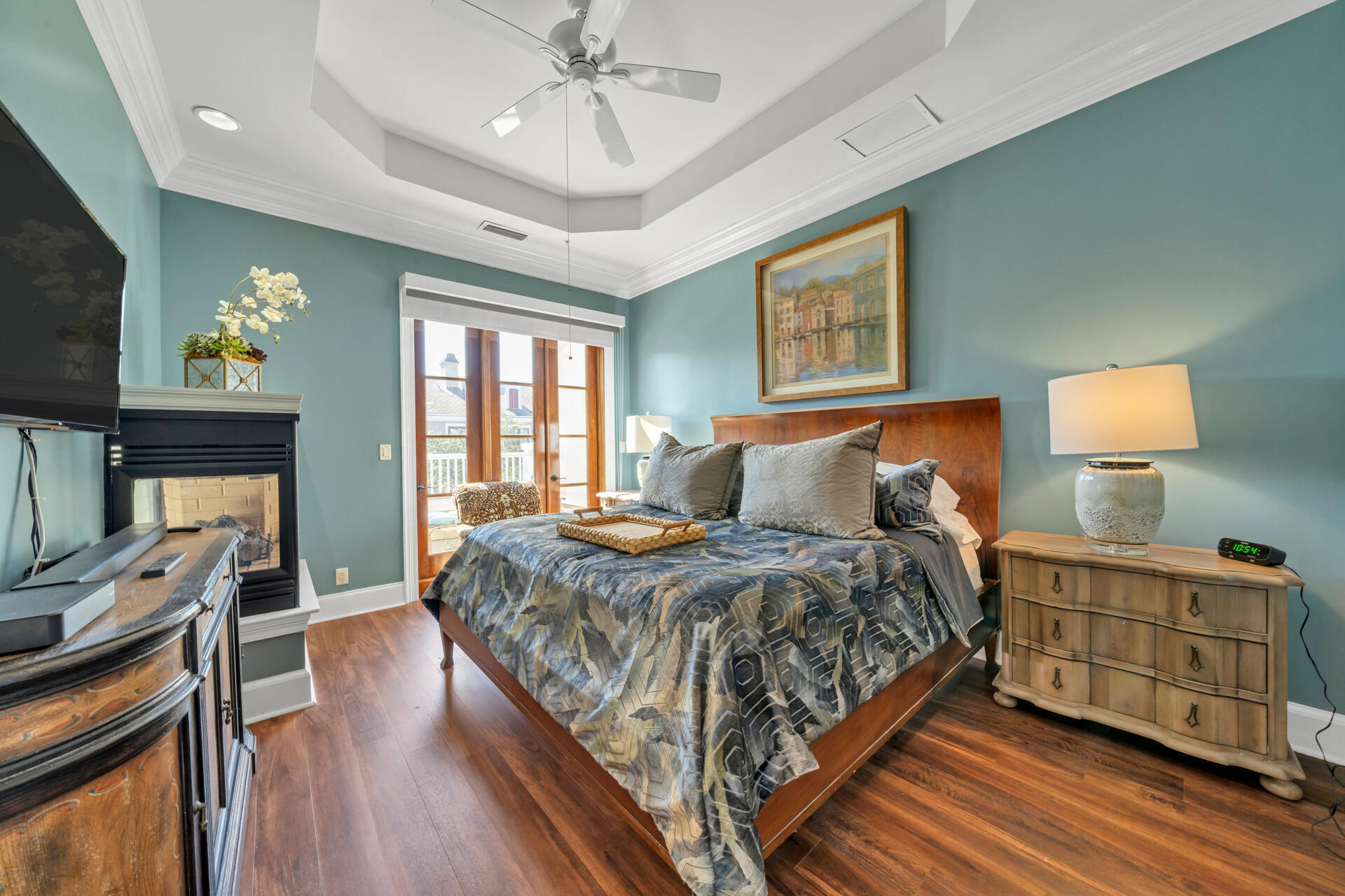 9201 Market Street Inn, Unit 162 Miramar Beach, FL 32550 - Photo 47 of 67 a bedroom with a bed and wooden floor