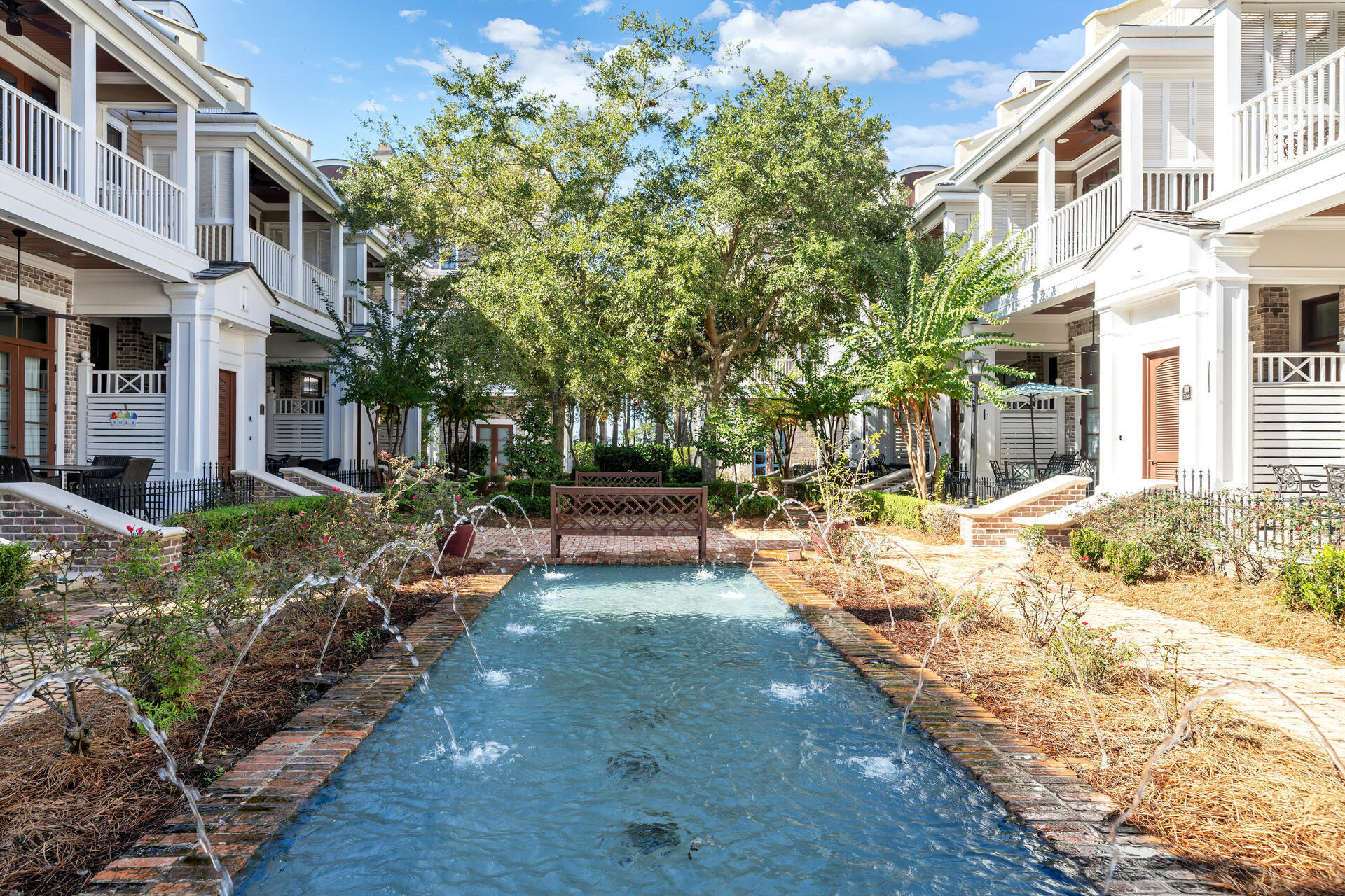 9201 Market Street Inn, Unit 162 Miramar Beach, FL 32550 - Photo 52 of 67 a view of a house with a yard