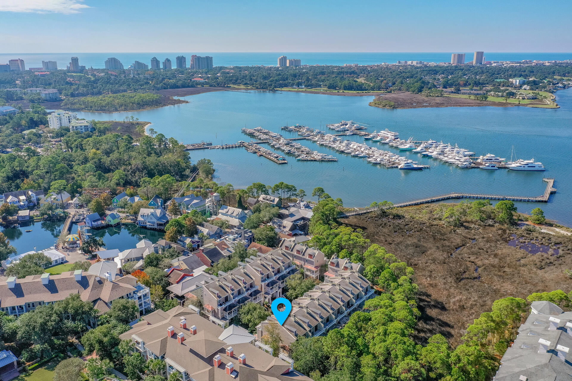 9201 Market Street Inn, Unit 162 Miramar Beach, FL 32550 - Photo 66 of 67 an aerial view of a houses with outdoor space and lake view