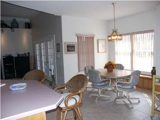 2585 Crescent Road Navarre, FL 32566 - Photo 3 of 7 a dining room with furniture and window