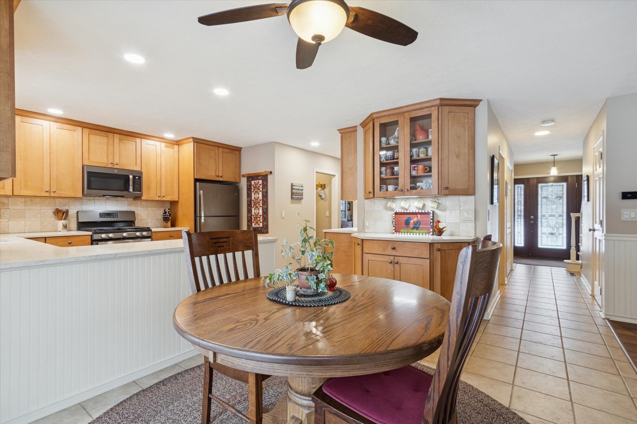 10906 Hamborg Road Roscoe, IL 61073 - Photo 20 of 65 a view of a dining room with furniture
