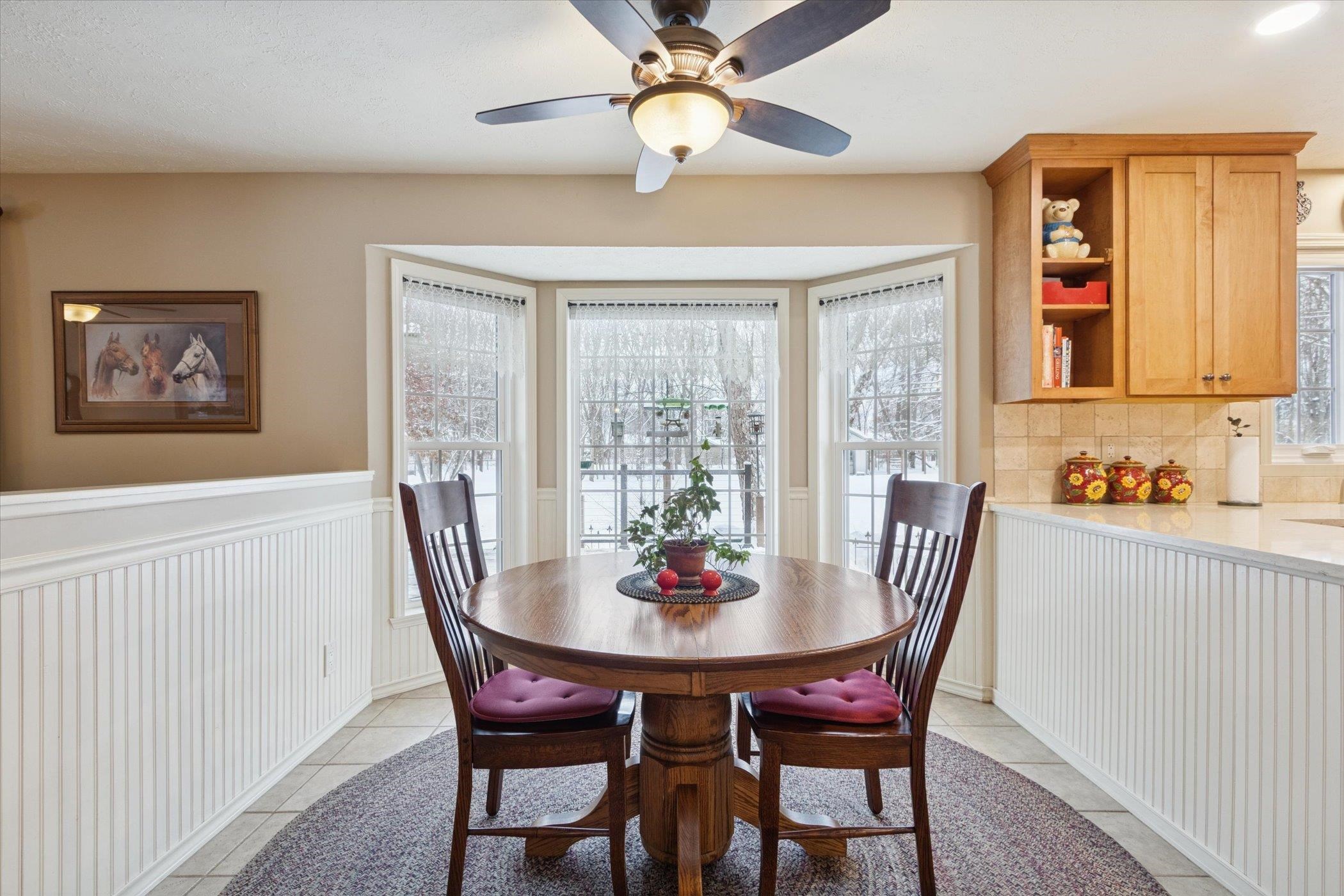 10906 Hamborg Road Roscoe, IL 61073 - Photo 21 of 65 a view of a dining room with furniture window and outside view