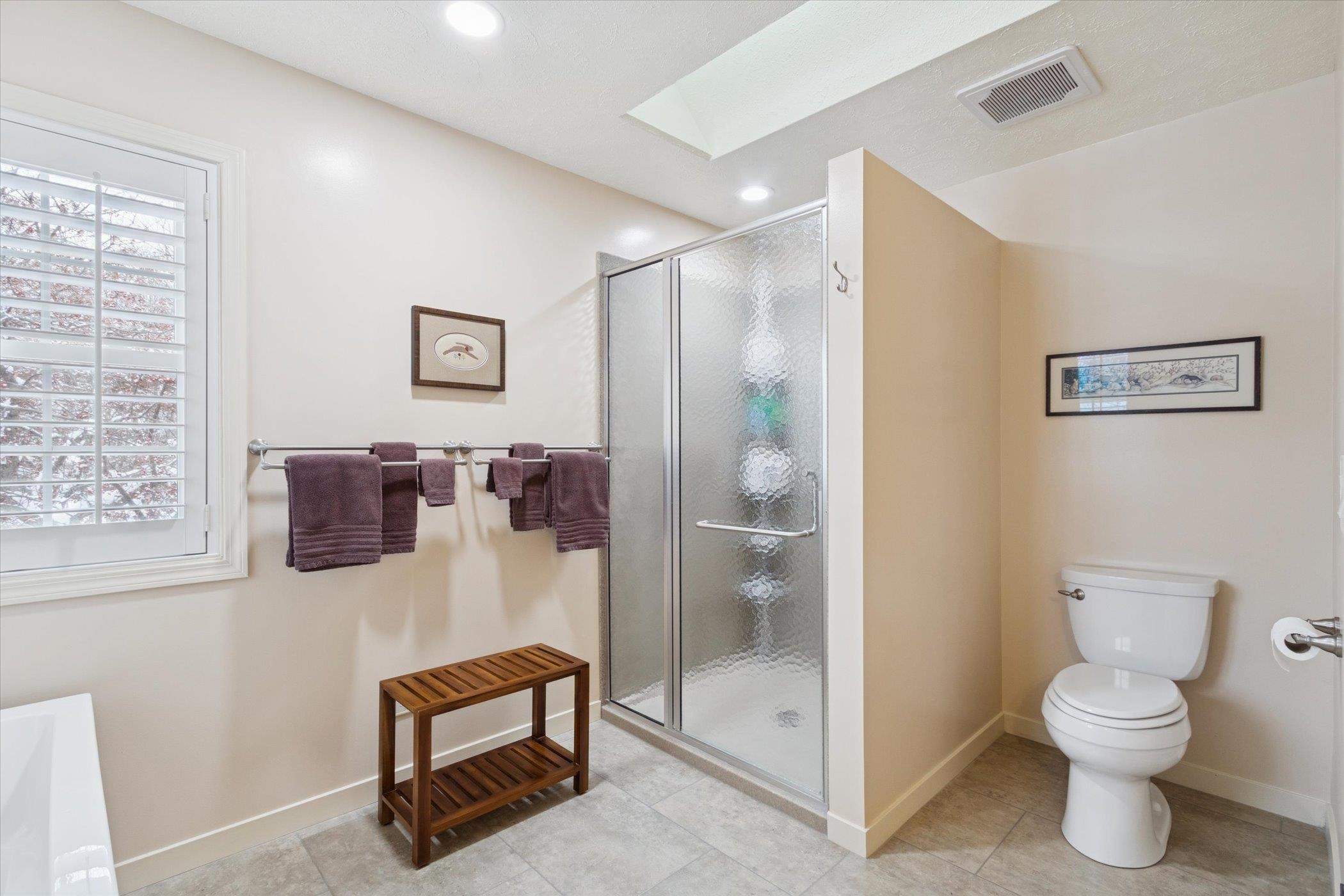 10906 Hamborg Road Roscoe, IL 61073 - Photo 40 of 65 a bathroom with a toilet and a shower