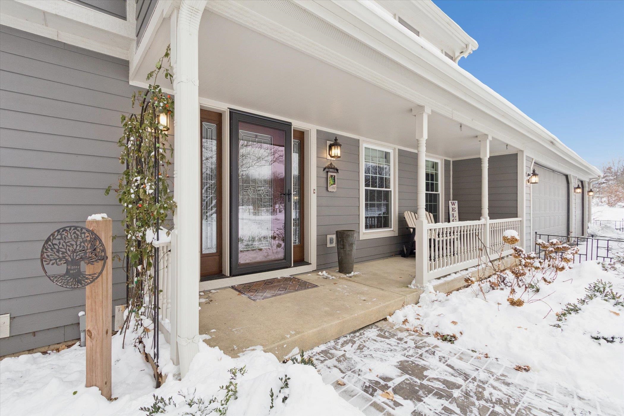 10906 Hamborg Road Roscoe, IL 61073 - Photo 4 of 65 a view of a entryway door of the house