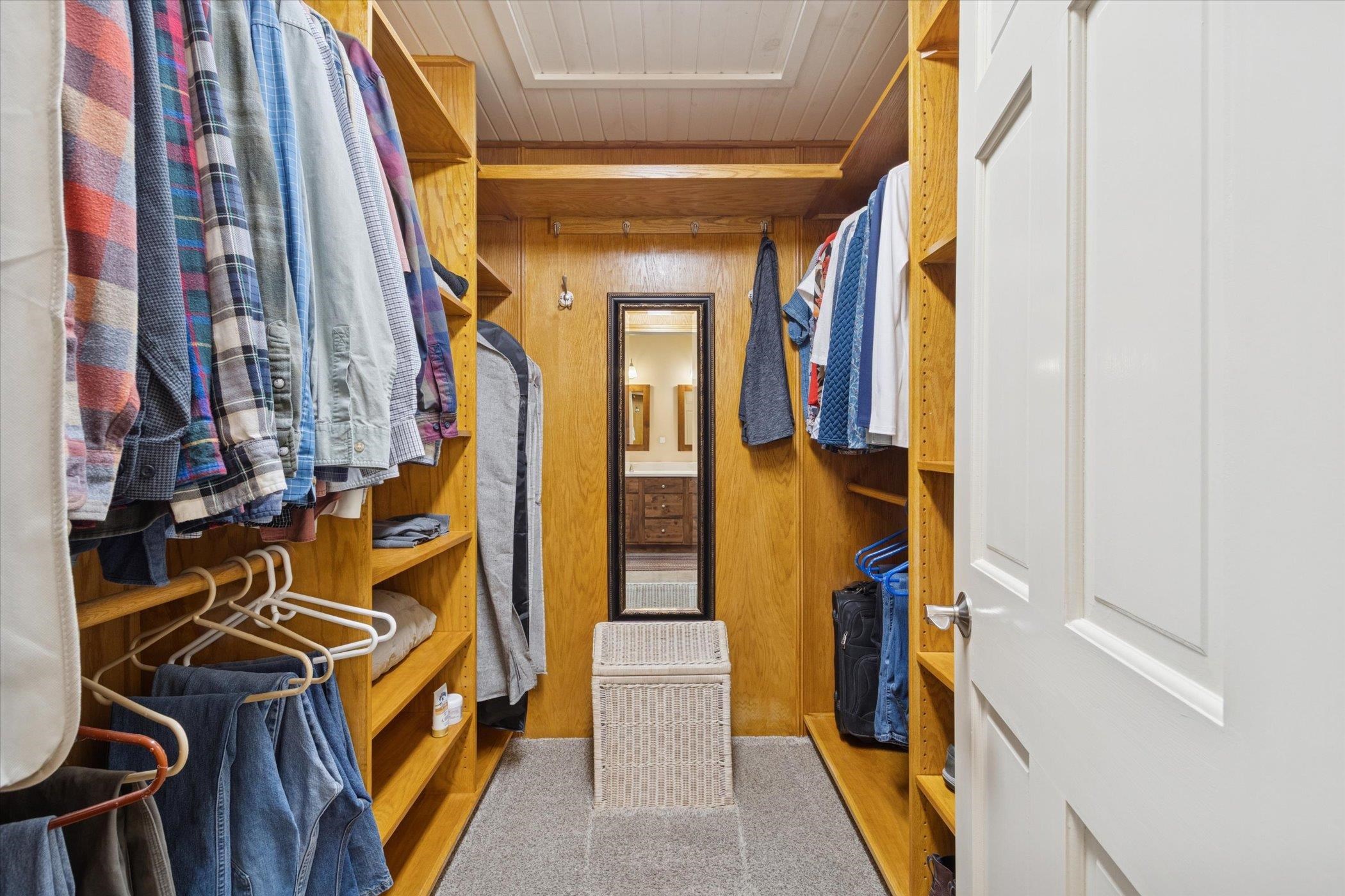 10906 Hamborg Road Roscoe, IL 61073 - Photo 41 of 65 a view of walk in closet with clothes and shoes