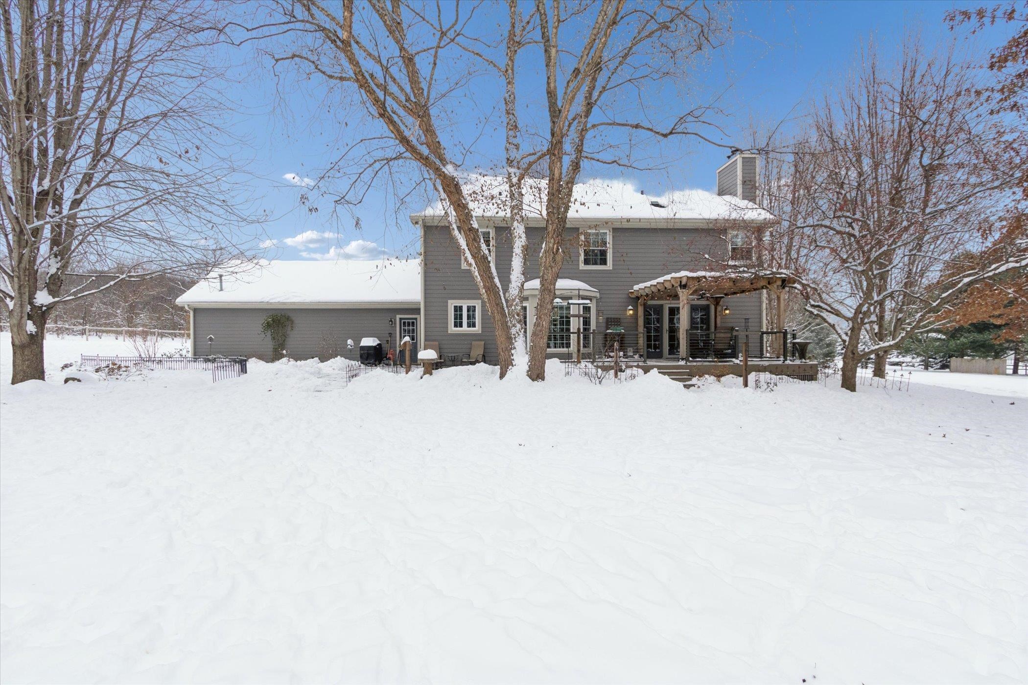 10906 Hamborg Road Roscoe, IL 61073 - Photo 52 of 65 a view of a house with snow on the road