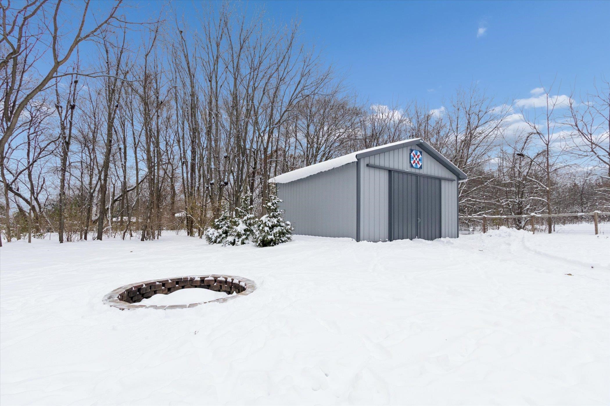 10906 Hamborg Road Roscoe, IL 61073 - Photo 55 of 65 a view of a backyard of the house