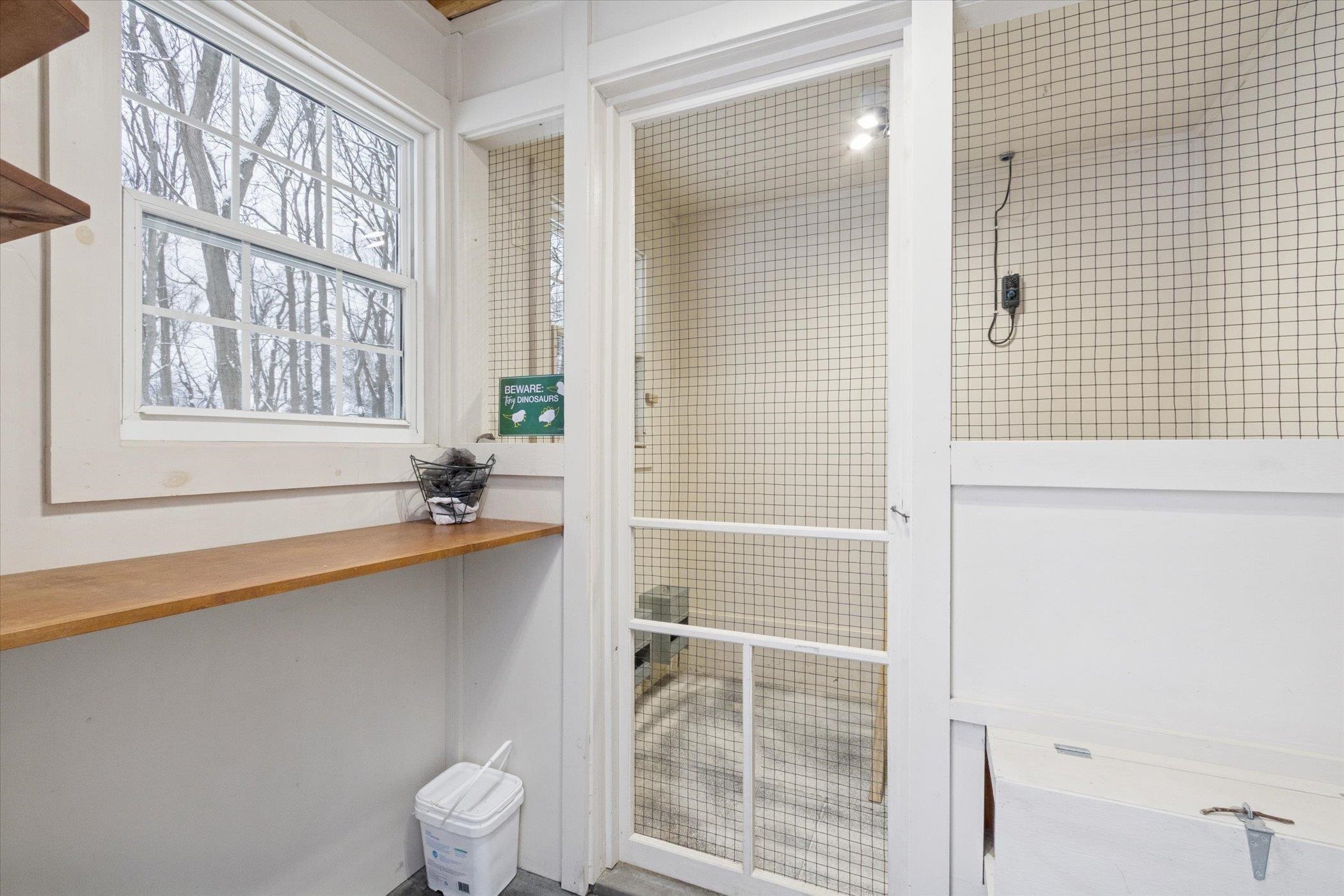 10906 Hamborg Road Roscoe, IL 61073 - Photo 58 of 65 a bathroom with a toilet a sink and a shower