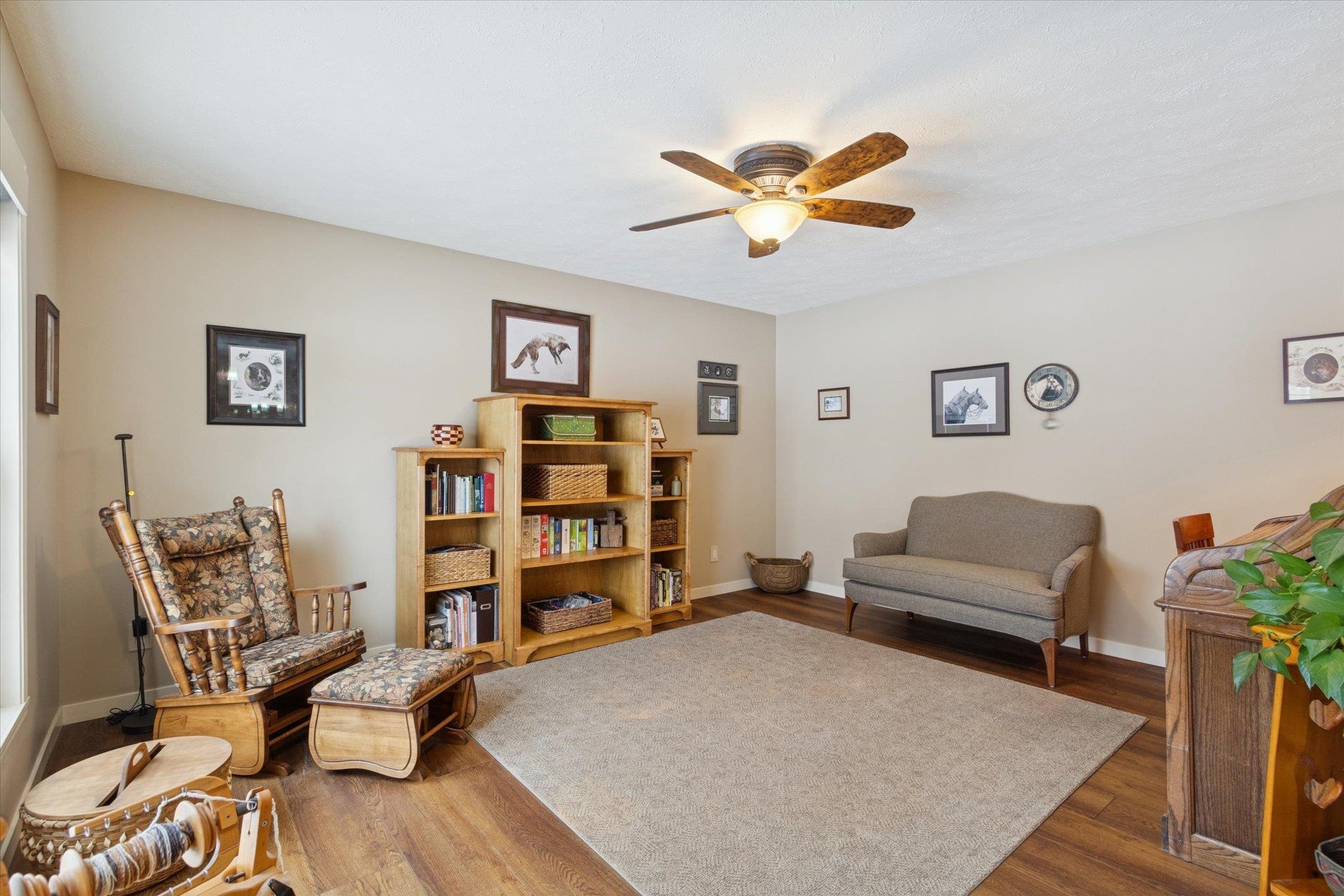 10906 Hamborg Road Roscoe, IL 61073 - Photo 9 of 65 a view of a livingroom with workspace and a couch