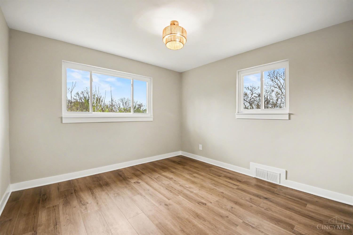 7230 Barret Road West Chester, OH 45069 - Photo 20 of 50 Back Bedroom. Same as the middle just slightly larger and brighter with the extra window.
