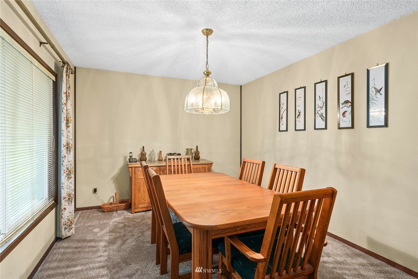 465 Sargent Road Winlock, WA 98596 - Photo 8 of 30 a view of a dining room with furniture window and wooden floor