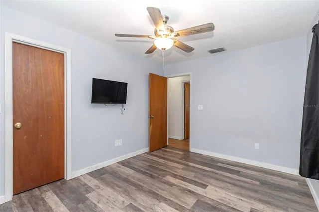 a view of a livingroom with a flat screen tv