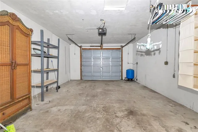 an aerial view of a house with outdoor space