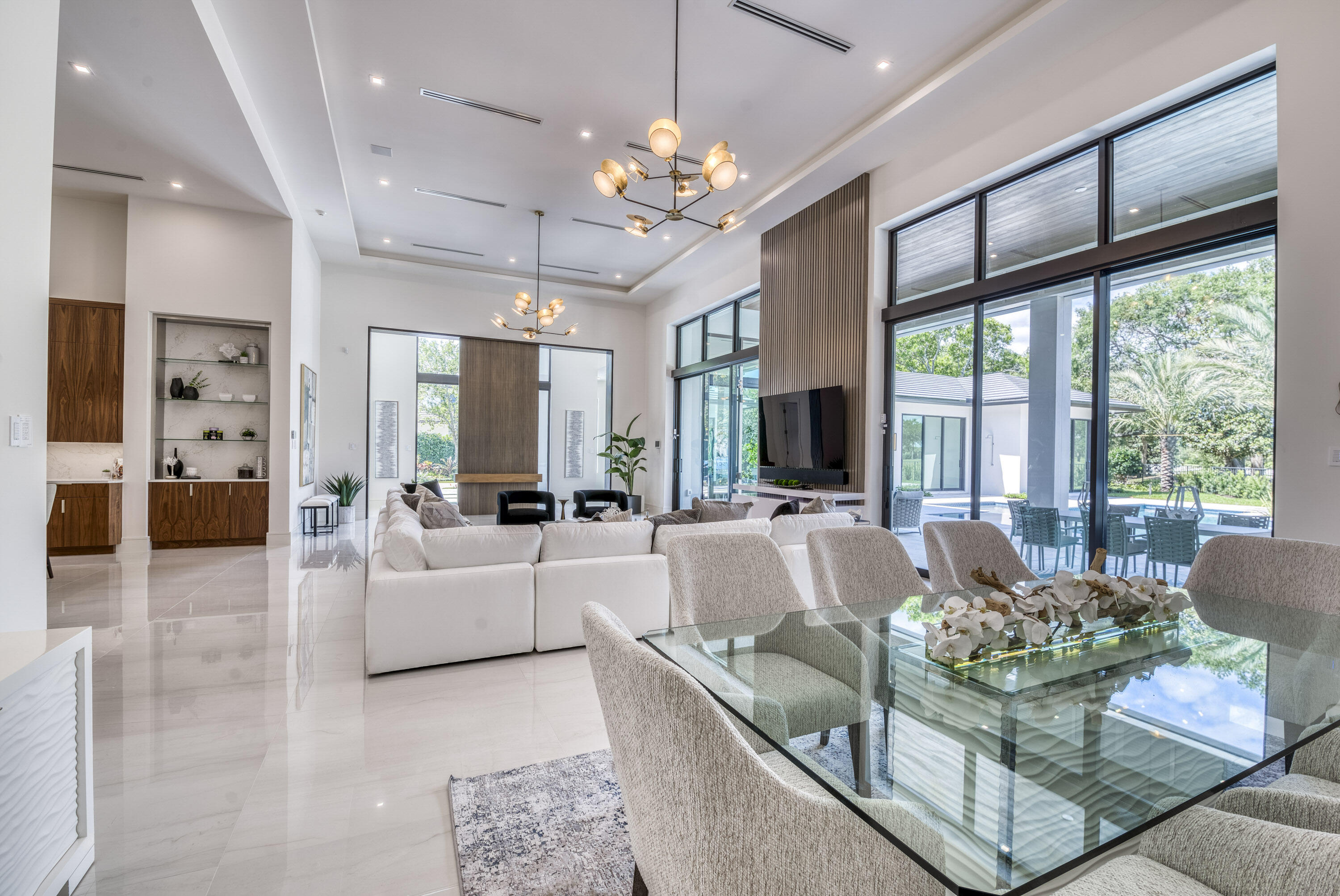 119 Clipper Lane Jupiter, FL 33477 - Photo 17 of 63 a living room with furniture and a large window