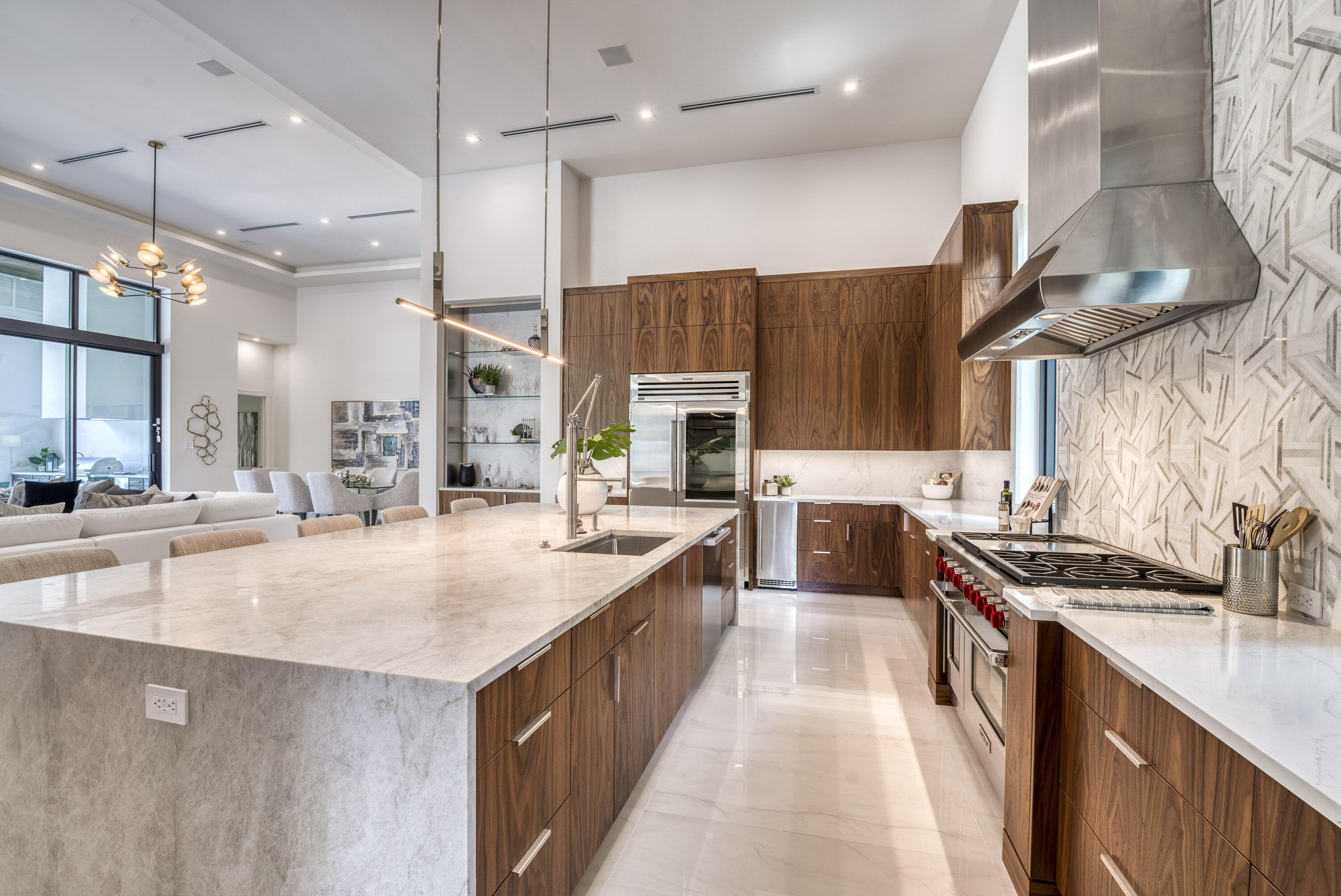 119 Clipper Lane Jupiter, FL 33477 - Photo 20 of 63 a kitchen with stainless steel appliances granite countertop a stove and a sink