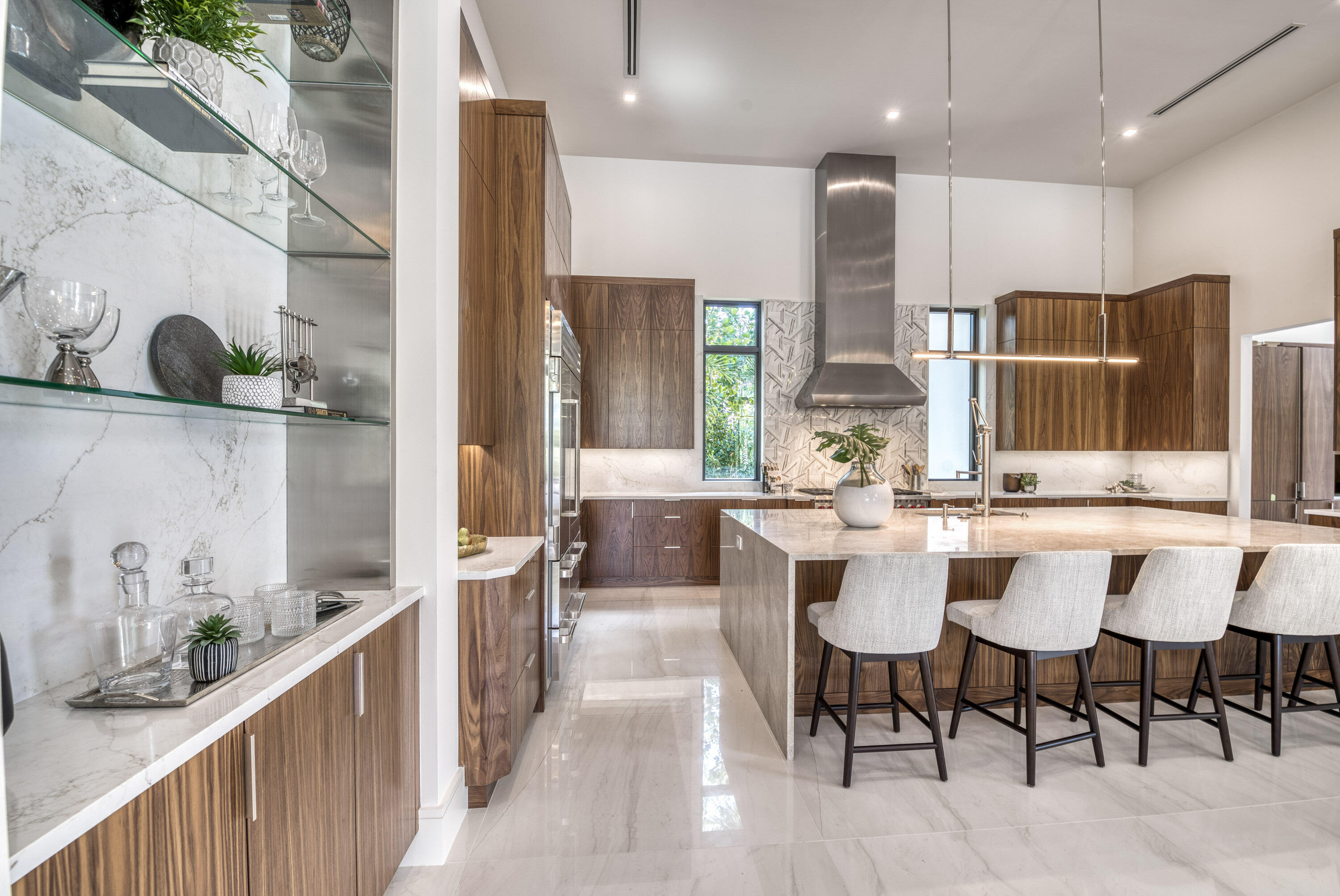 119 Clipper Lane Jupiter, FL 33477 - Photo 22 of 63 a large kitchen with a table and chairs