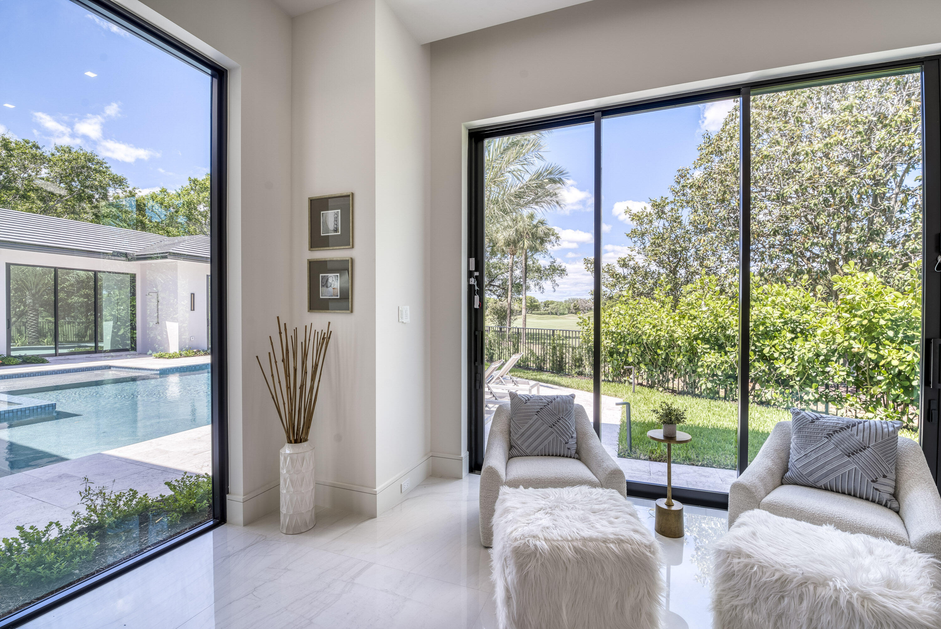 119 Clipper Lane Jupiter, FL 33477 - Photo 26 of 63 a living room with furniture and a large window
