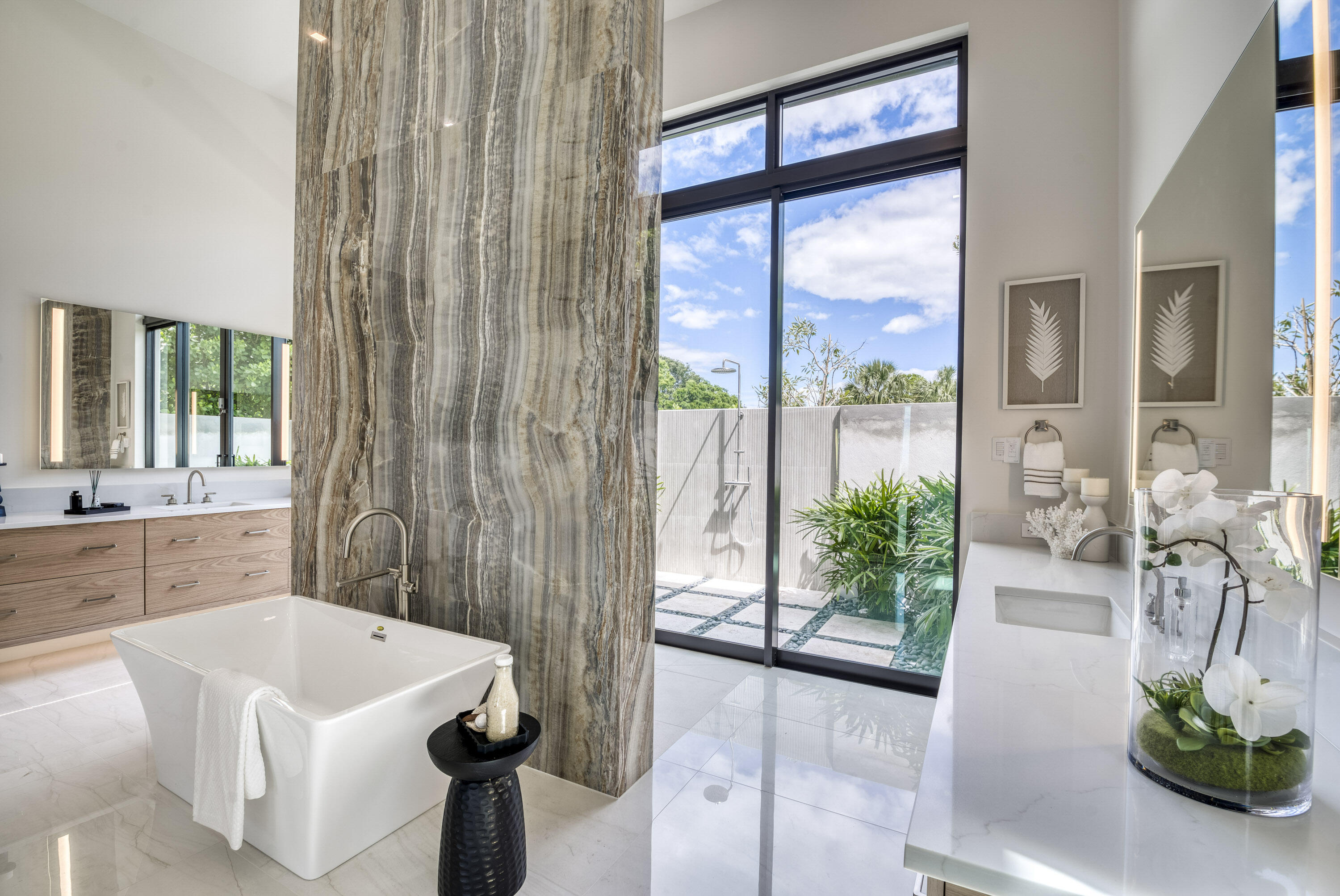 119 Clipper Lane Jupiter, FL 33477 - Photo 28 of 63 a white bath tub sitting in a bathroom next to a window