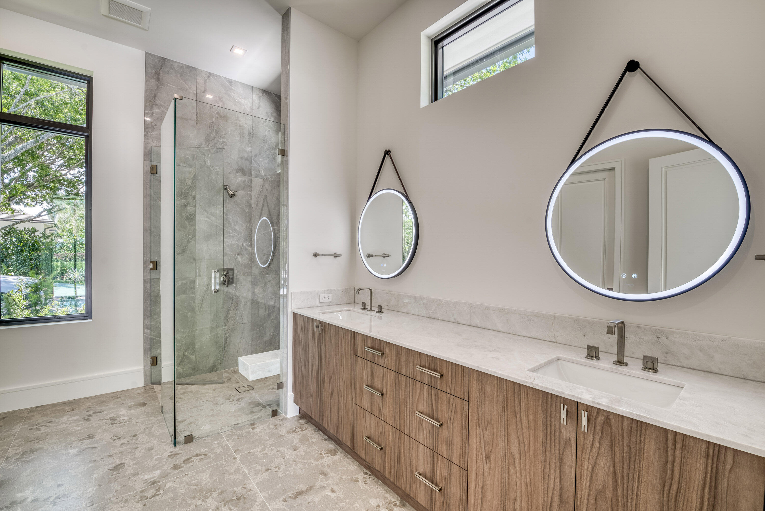 119 Clipper Lane Jupiter, FL 33477 - Photo 39 of 63 a bathroom with a double vanity sink mirror and shower