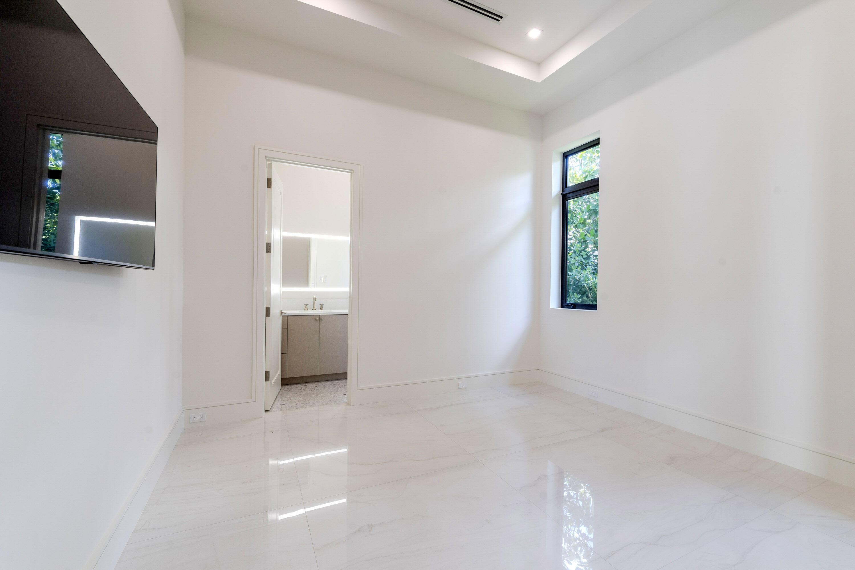 119 Clipper Lane Jupiter, FL 33477 - Photo 43 of 63 an empty room with windows