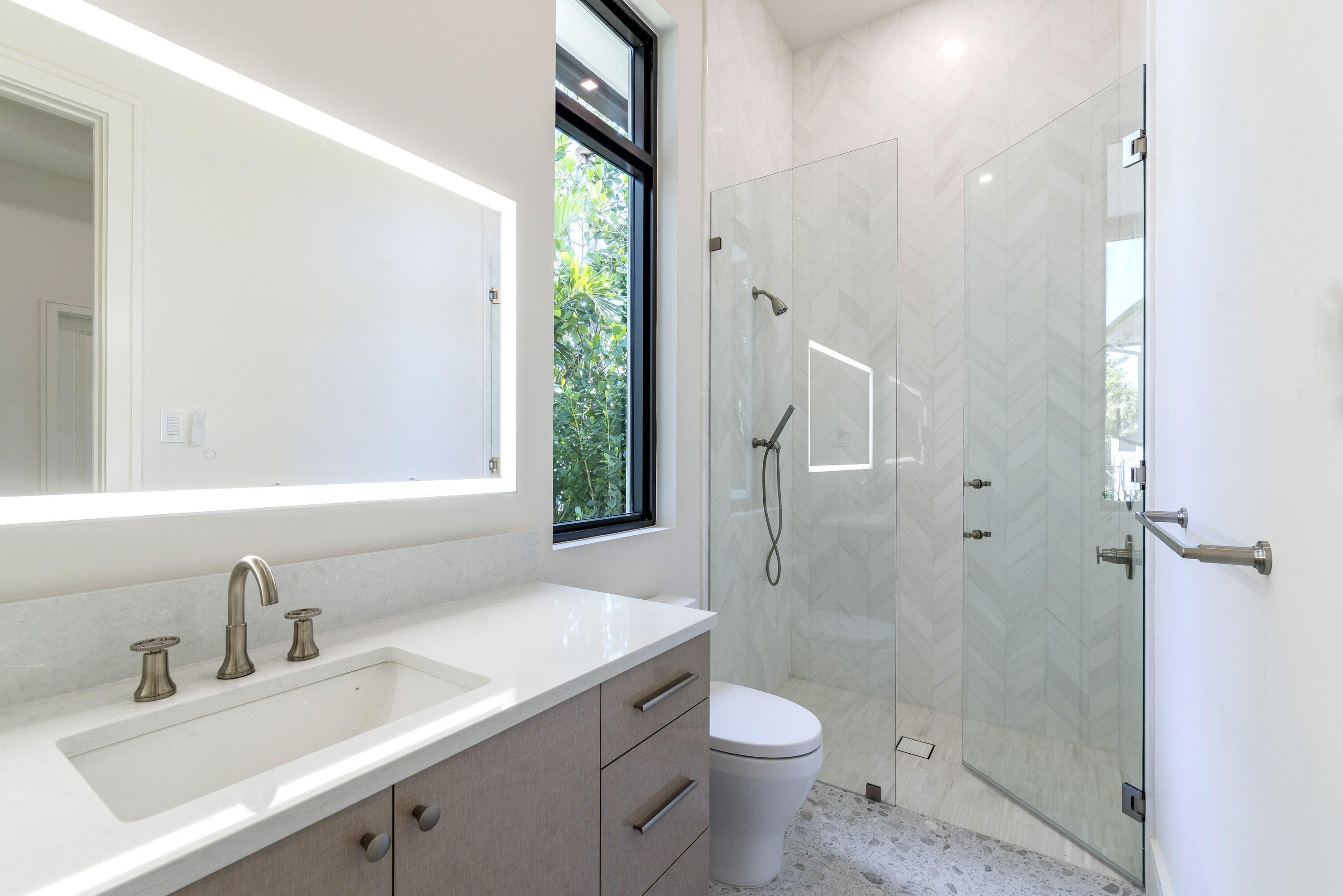 119 Clipper Lane Jupiter, FL 33477 - Photo 44 of 63 a bathroom with a sink a toilet and shower