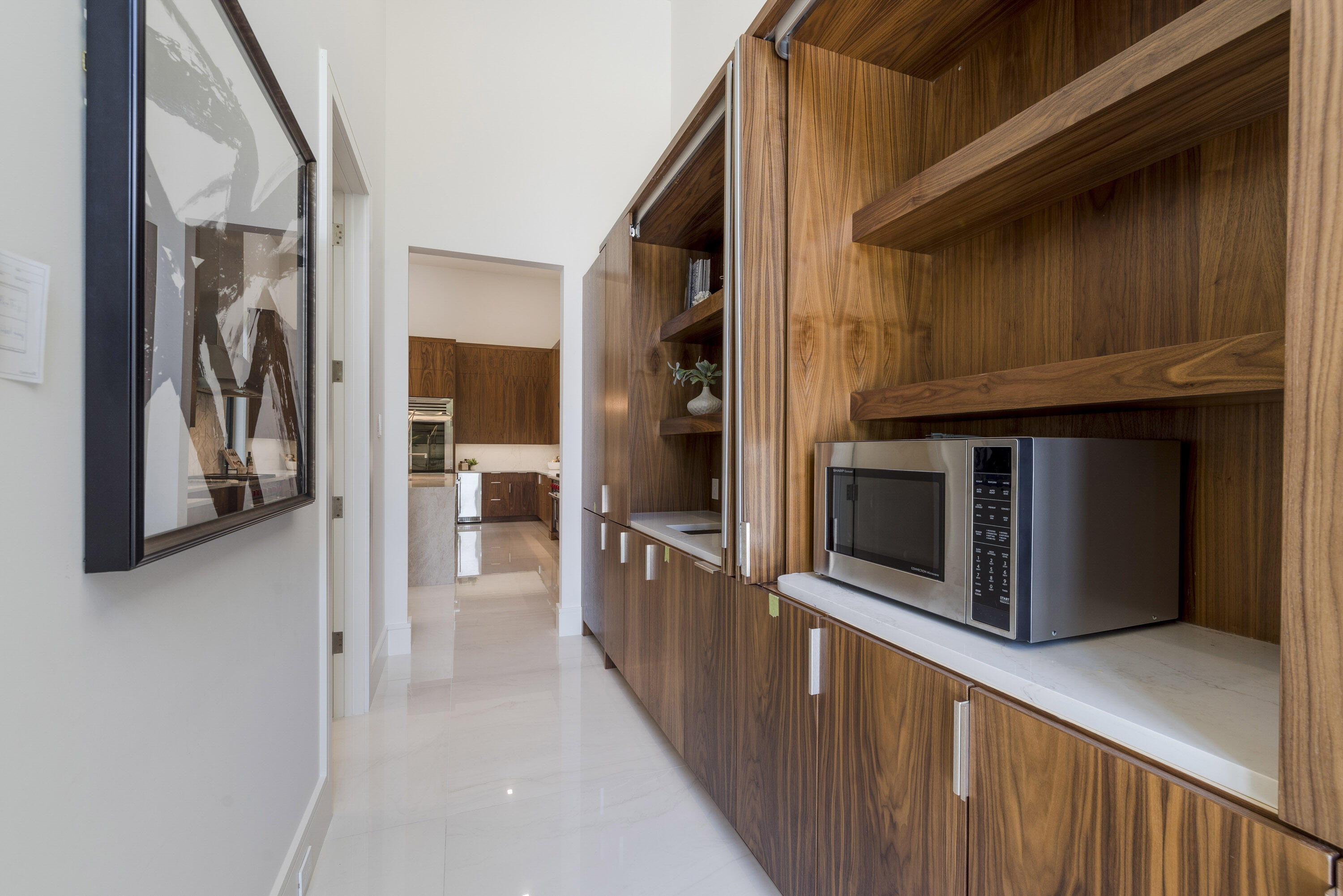 119 Clipper Lane Jupiter, FL 33477 - Photo 46 of 63 a kitchen with stainless steel appliances kitchen island granite countertop a refrigerator and a stove top oven