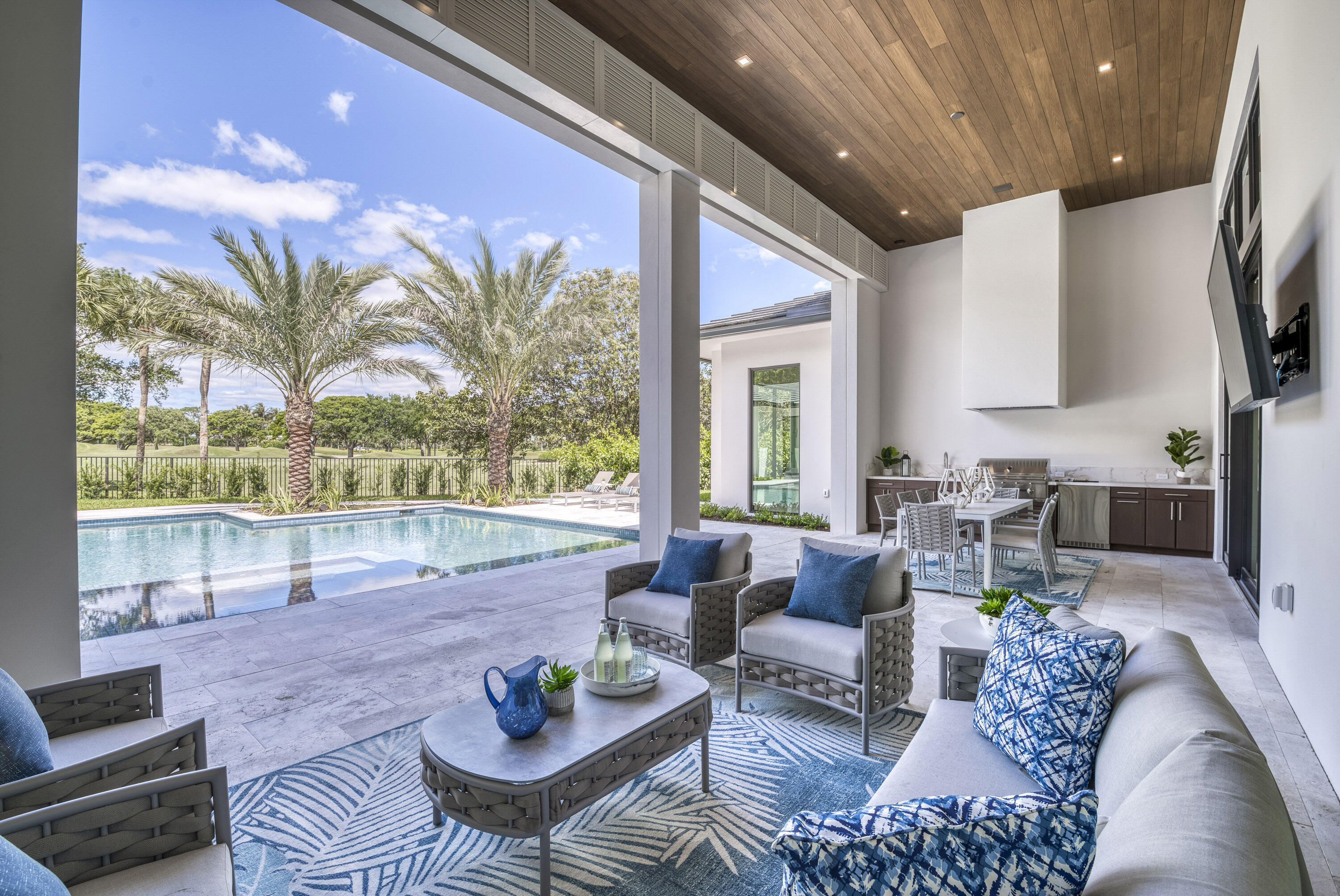 119 Clipper Lane Jupiter, FL 33477 - Photo 47 of 63 a living room with furniture and a large window