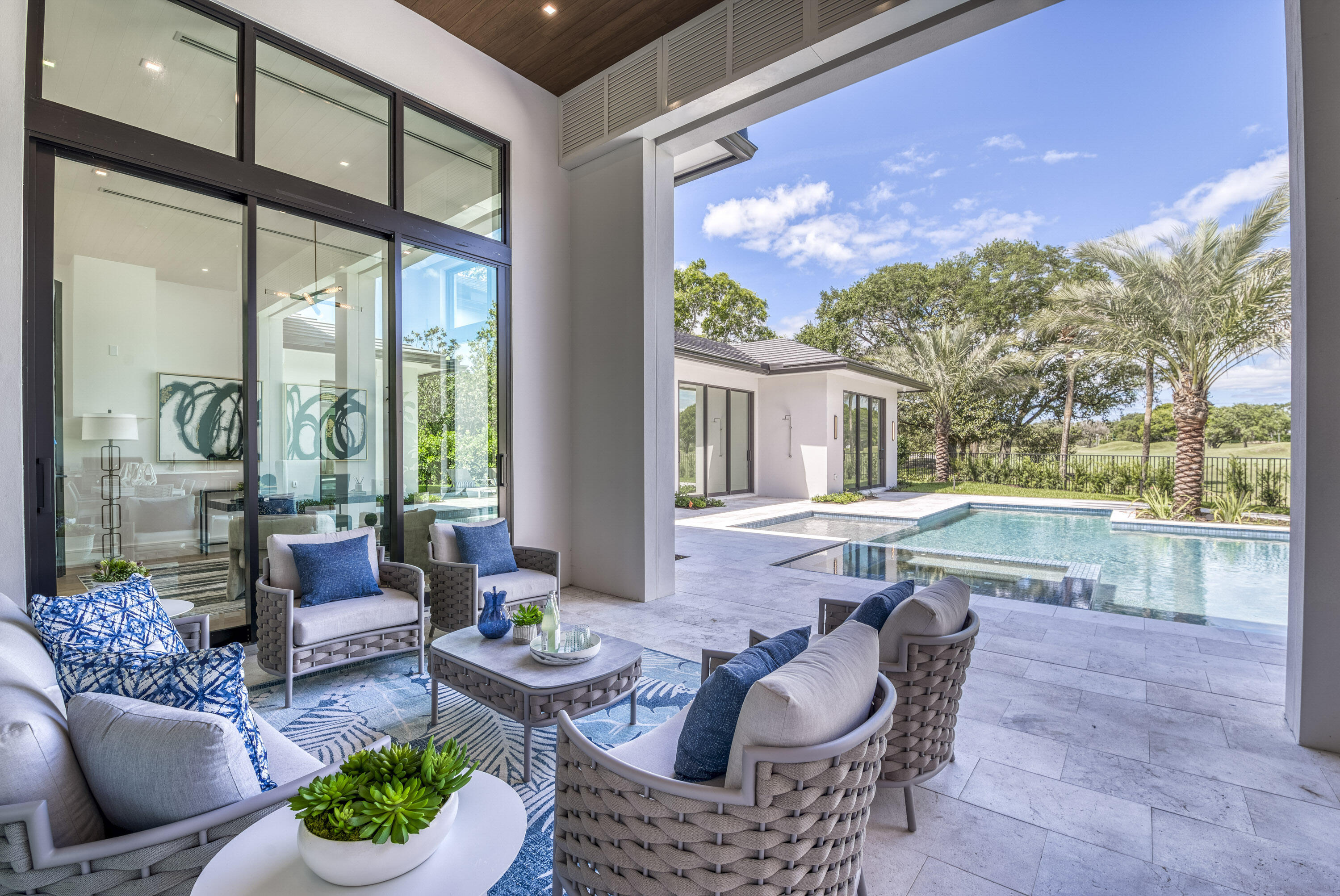 119 Clipper Lane Jupiter, FL 33477 - Photo 48 of 63 a living room with furniture and a large window