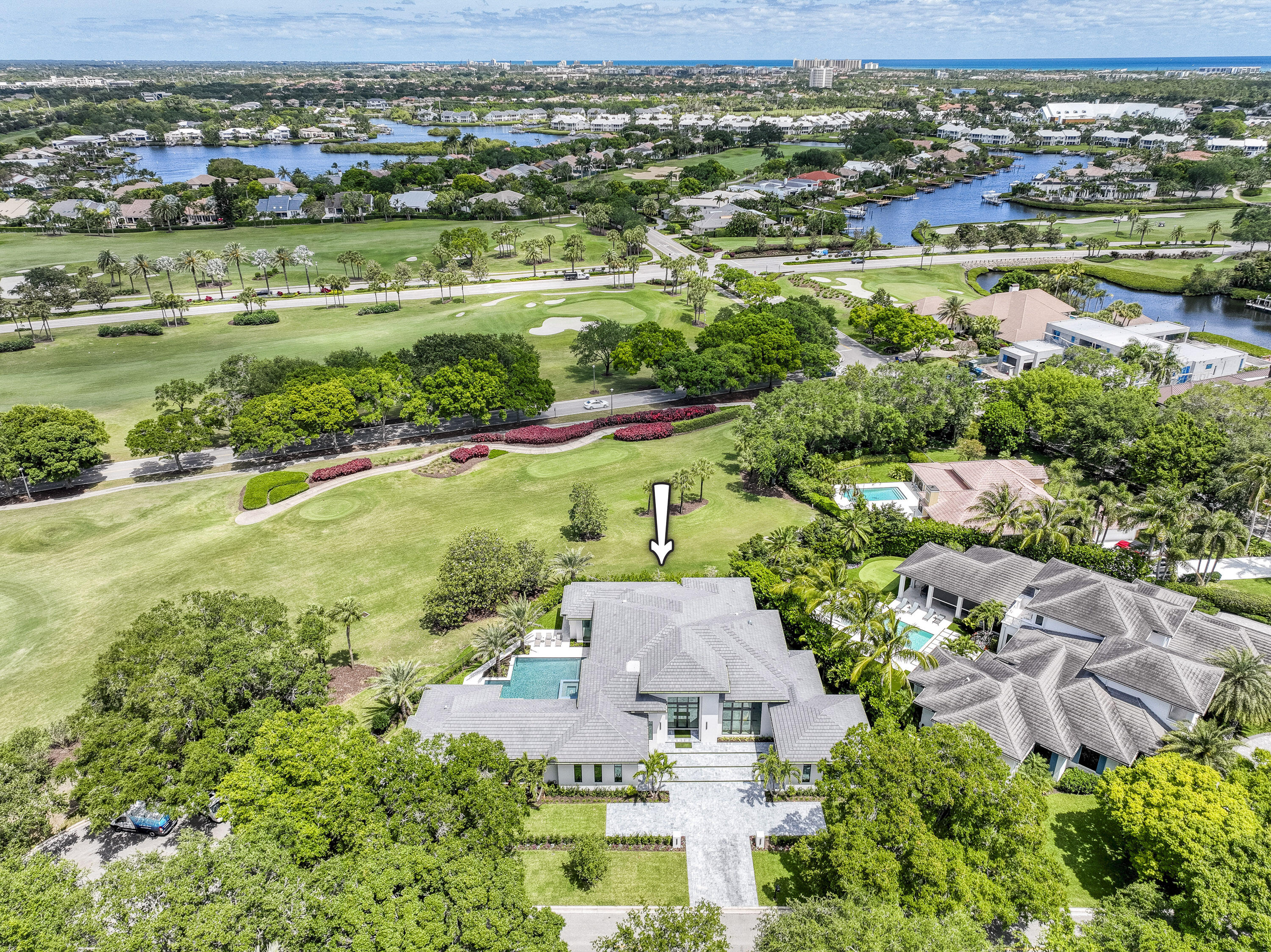 119 Clipper Lane Jupiter, FL 33477 - Photo 63 of 63 an aerial view of residential houses with outdoor space and trees