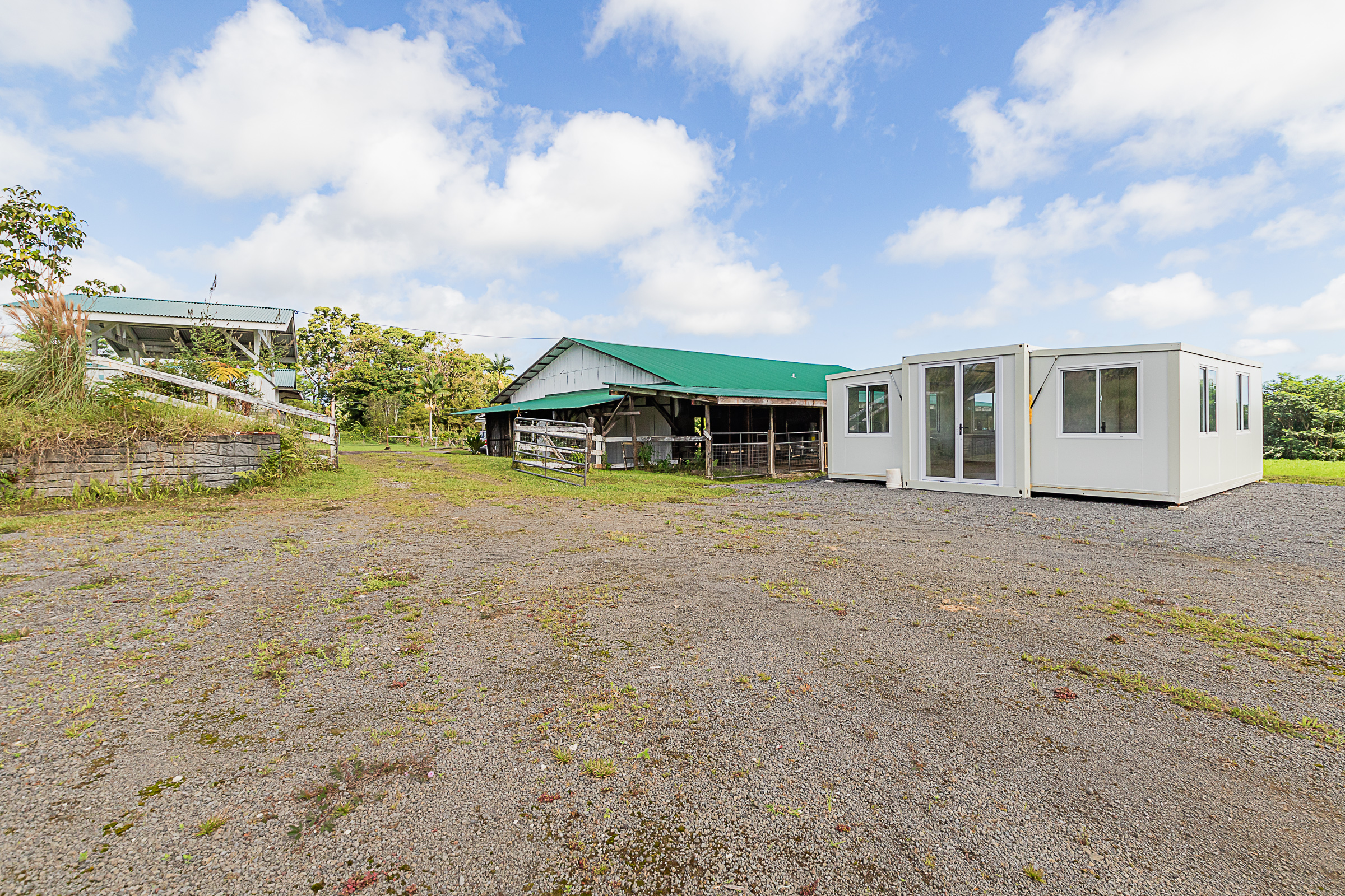 681 Hoaka Road Hilo, HI 96720 - Photo 17 of 26 a view of a house with backyard and sitting area