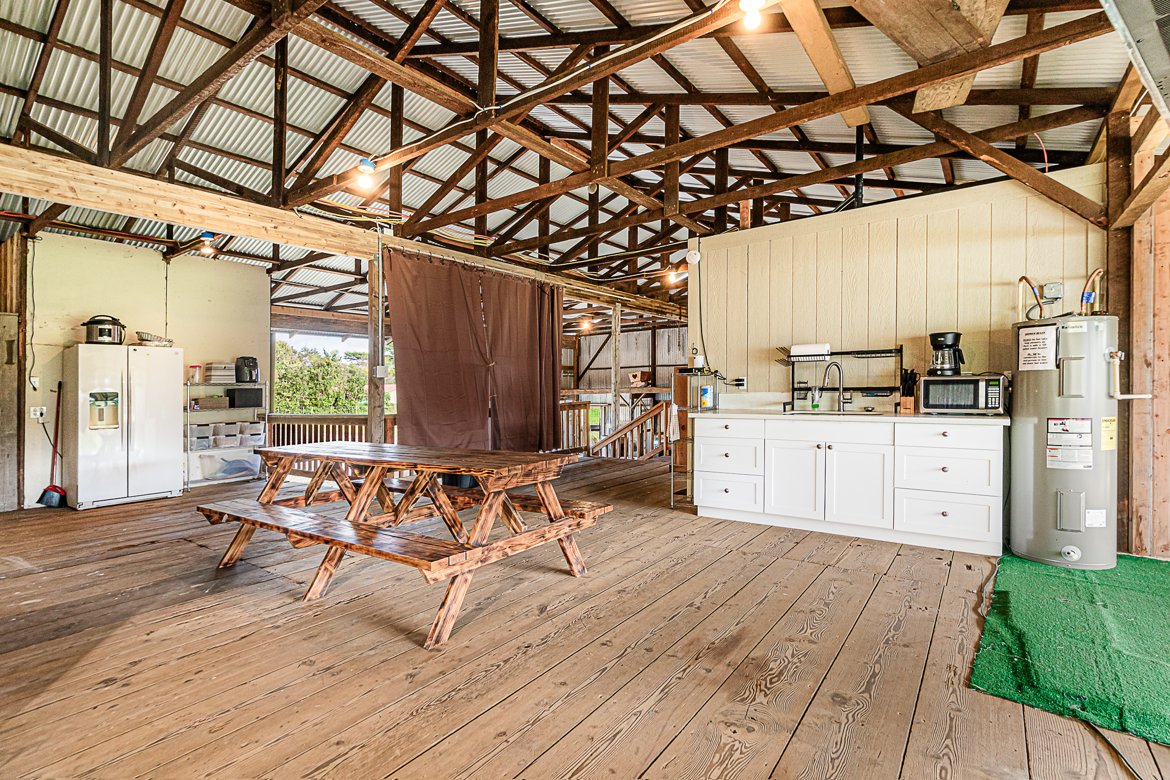 681 Hoaka Road Hilo, HI 96720 - Photo 3 of 26 a view of a kitchen with electric equipment