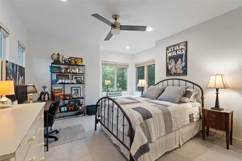 a bathroom with a sink toilet tub and shower