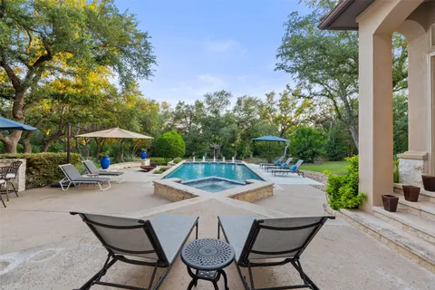 a view of a house with swimming pool