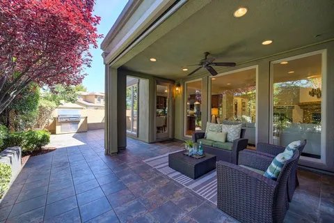 a outdoor living space with furniture and garden view