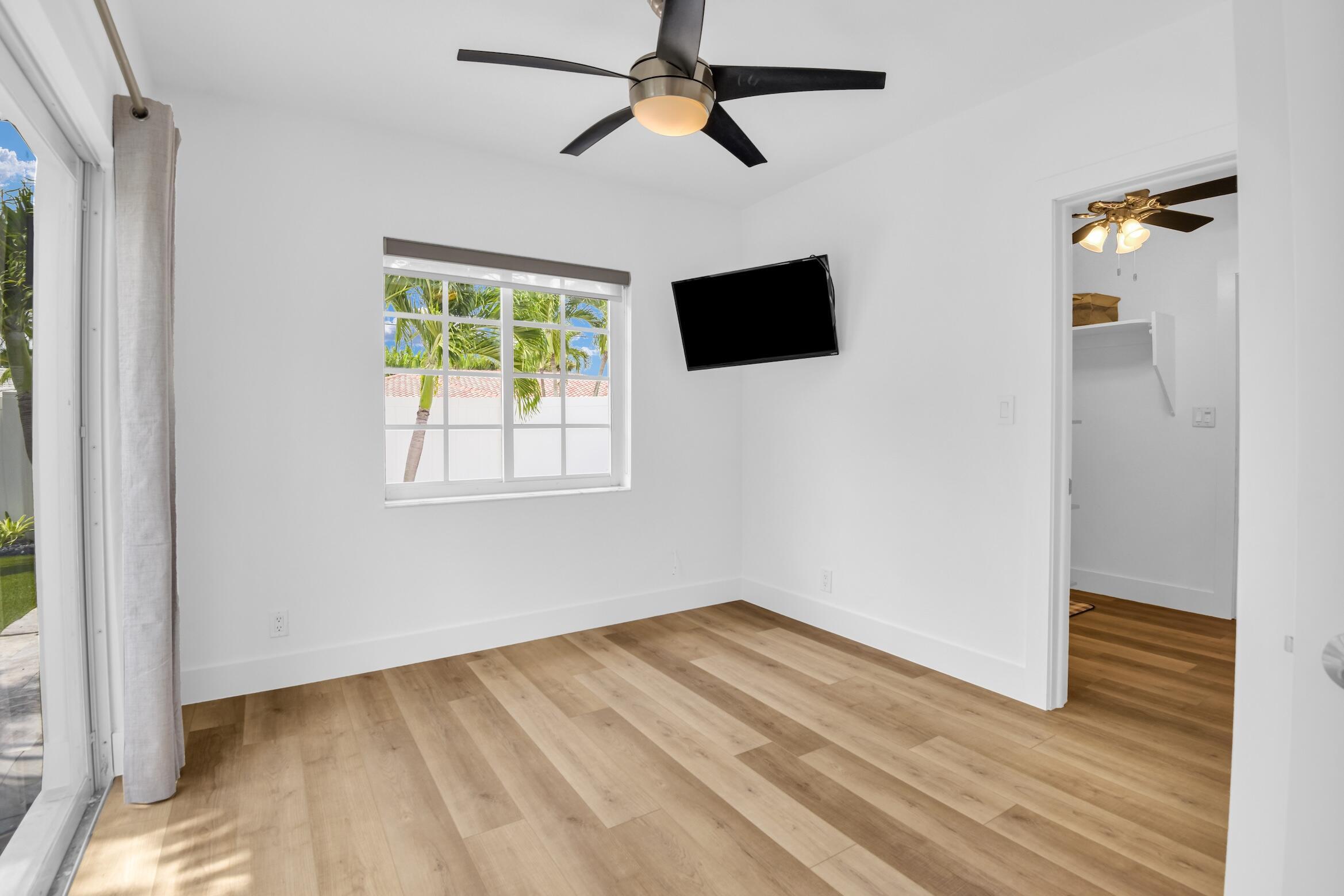 701 Appleby Street Boca Raton, FL 33487 - Photo 39 of 47 a view of a livingroom with a flat screen tv