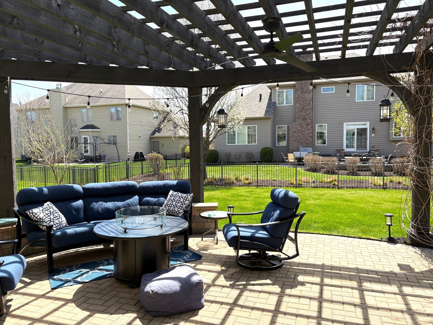 2212 Spartina Road Naperville, IL 60564 - Photo 15 of 17 a swimming pool with outdoor seating and garden