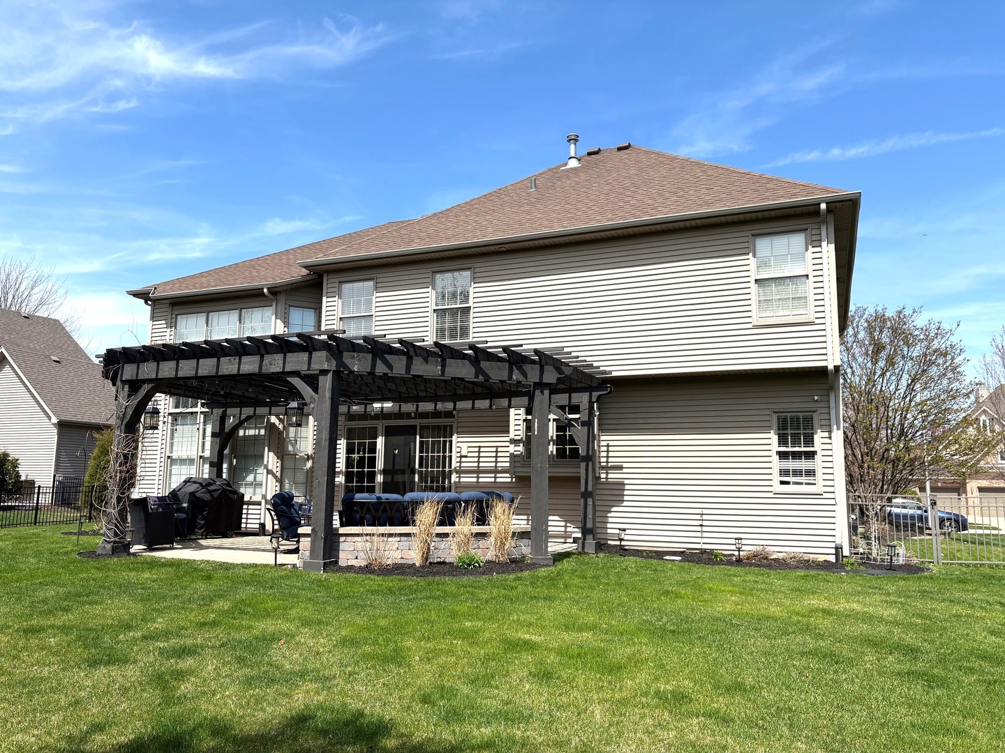 2212 Spartina Road Naperville, IL 60564 - Photo 17 of 17 a front view of a house with a garden