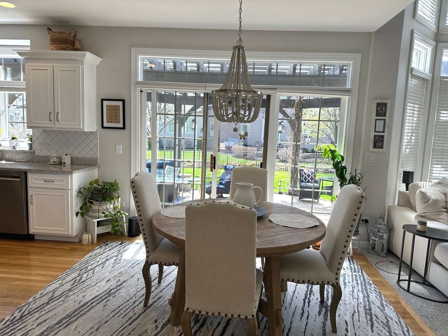 2212 Spartina Road Naperville, IL 60564 - Photo 6 of 17 a view of a dining room with furniture window and wooden floor