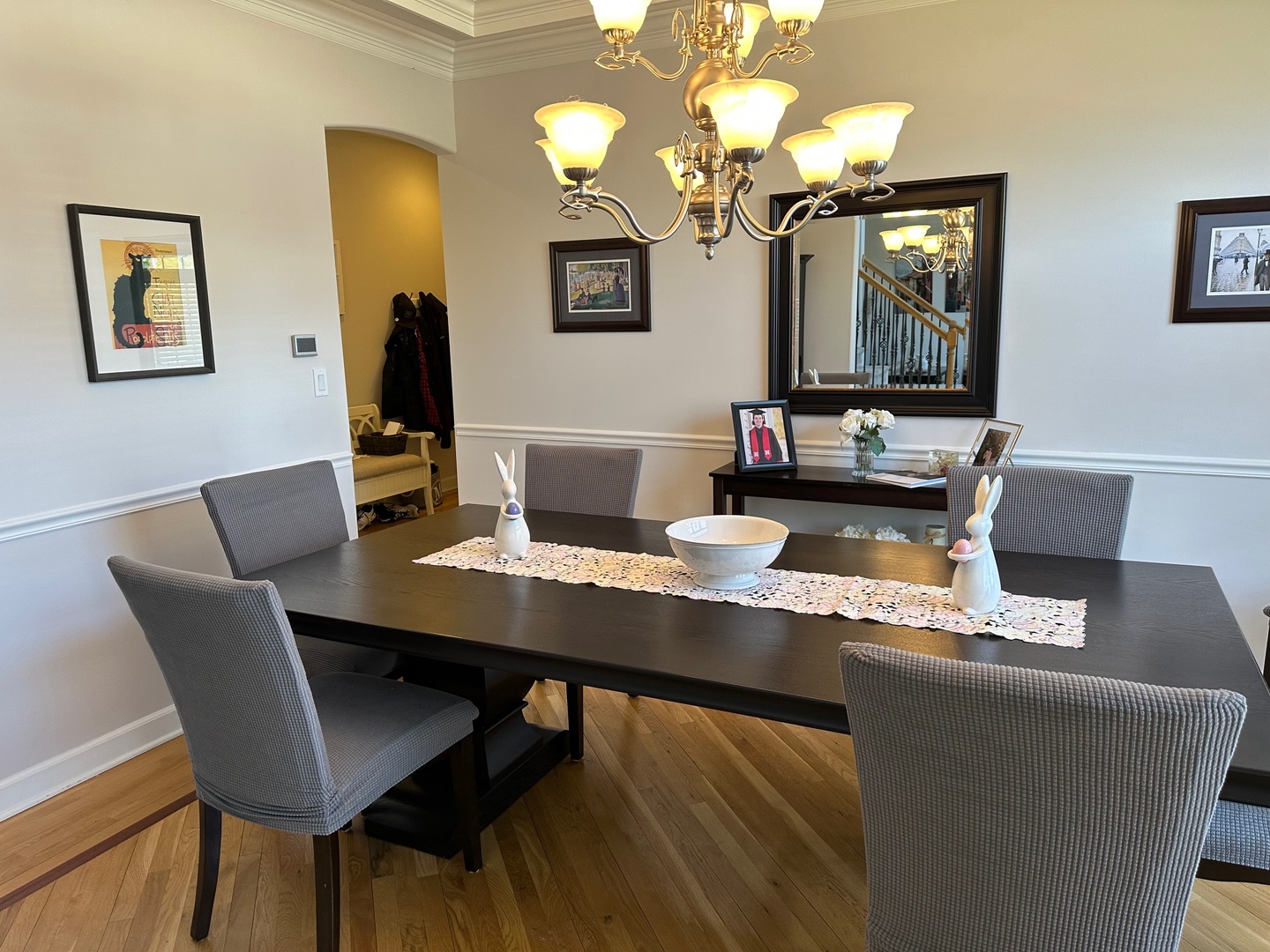2212 Spartina Road Naperville, IL 60564 - Photo 8 of 17 a view of a dining room with furniture and a chandelier